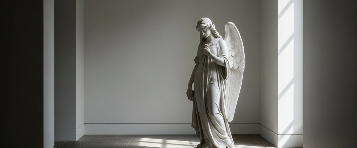 The Quiet Drama of a Marble Angel Statue Indoors - angel statue marble