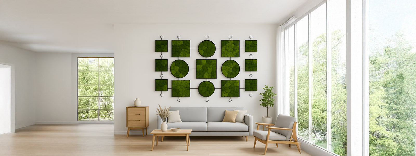 A minimalist living room with white walls, a large window, and a plant in a corner. Artwork featuring framed plants hangs on the wall above a gray bench. A vase with branches sits on a white cabinet.