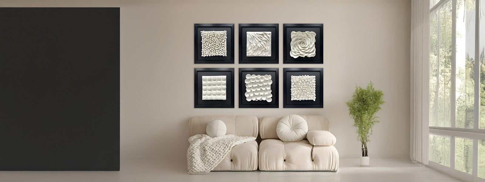 Six framed white ceramic art pieces with varied sculptural textures in a two-by-three grid above a beige tufted sofa in a living room setting.