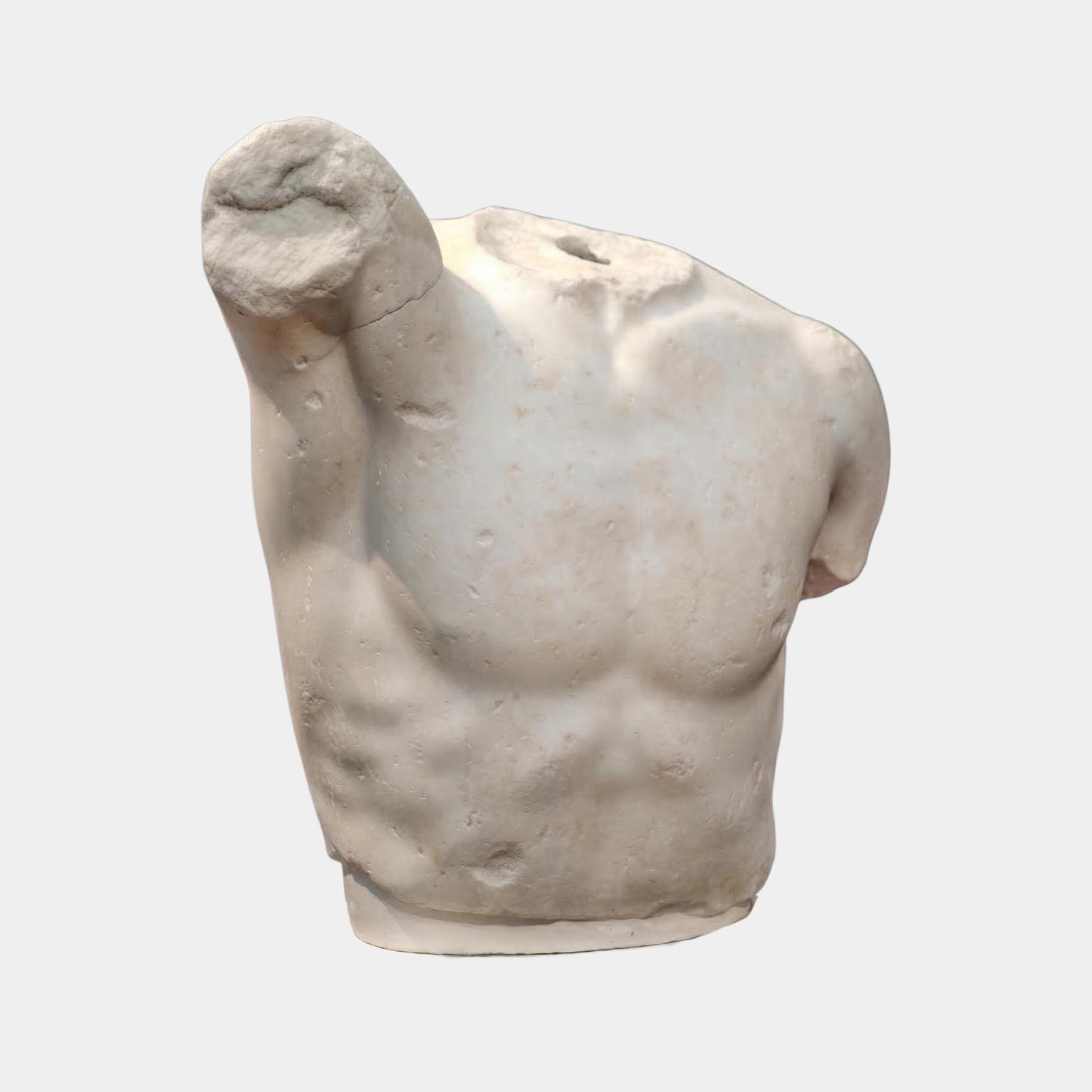 The Classical Male Torso Fragment Sculpture - 80cm by Giant Sculptures features a detailed, headless male torso carved from natural white marble with defined muscles and a smooth, weathered finish. Arms and lower body are missing.