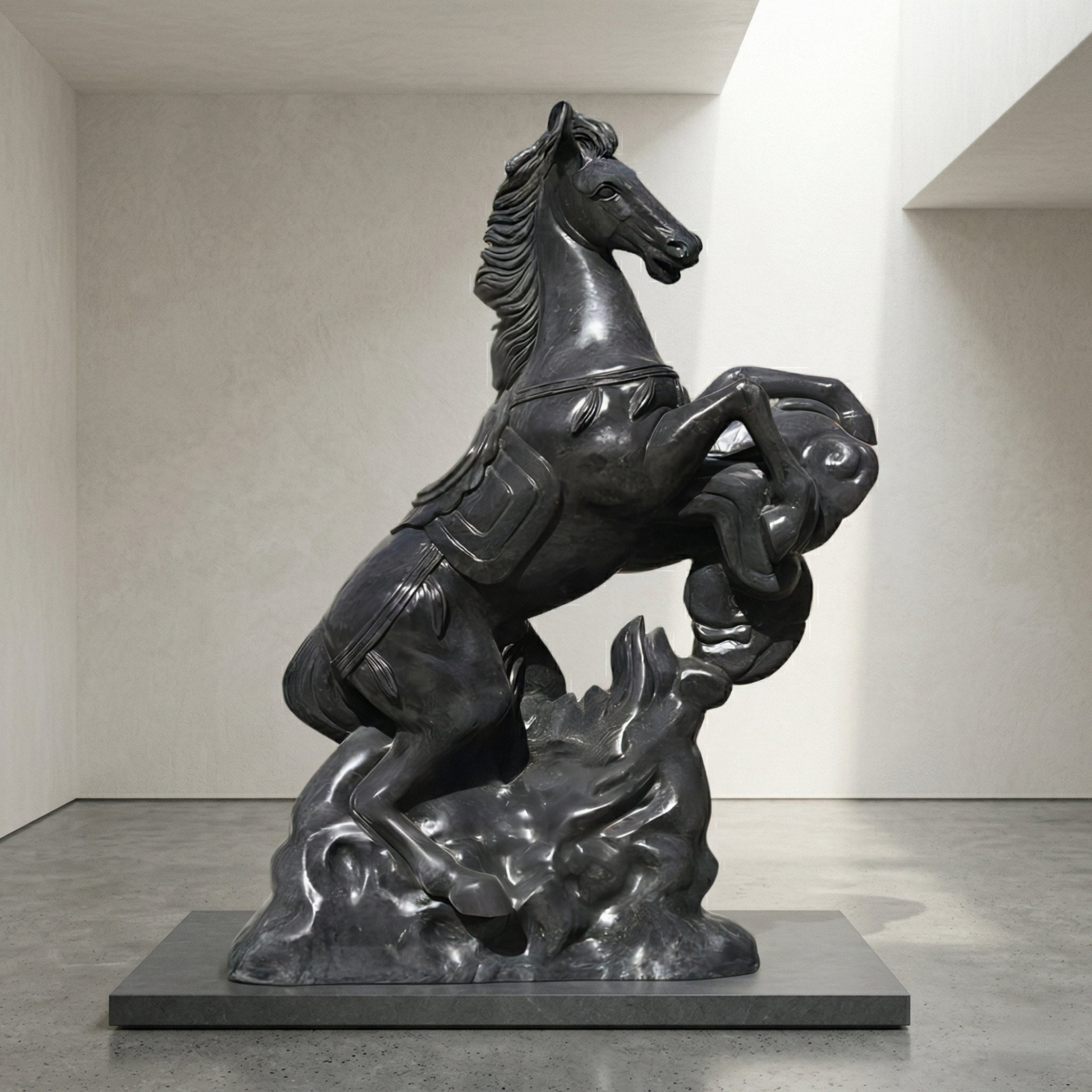 The Rearing Horse Black Marble Outdoor Sculpture (200cm) by Giant Sculptures stands atop a black pedestal, commanding attention in a minimalist gallery with light walls and a concrete floor.
