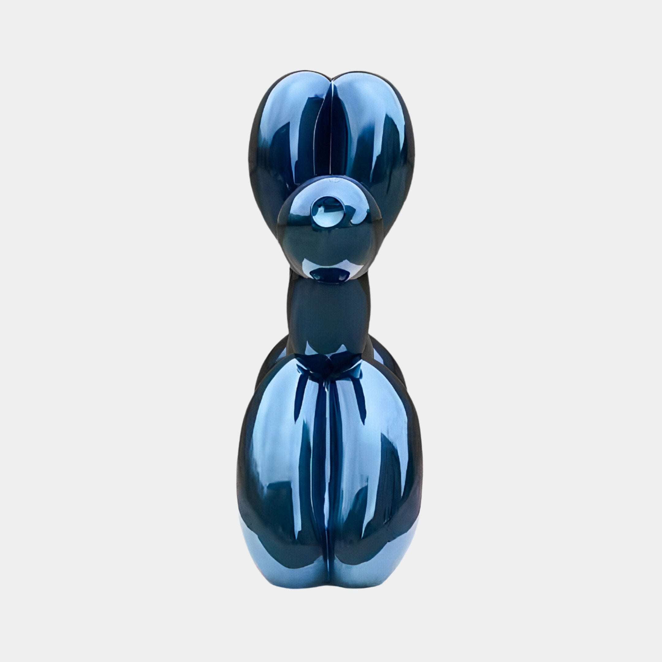 The Sapphire Blue Balloon Dog Sculpture by Giant Sculptures, standing at 200cm, is a striking piece of decor against a white background. Resembling an inflated balloon dog, it captures the whimsical spirit of contemporary art.