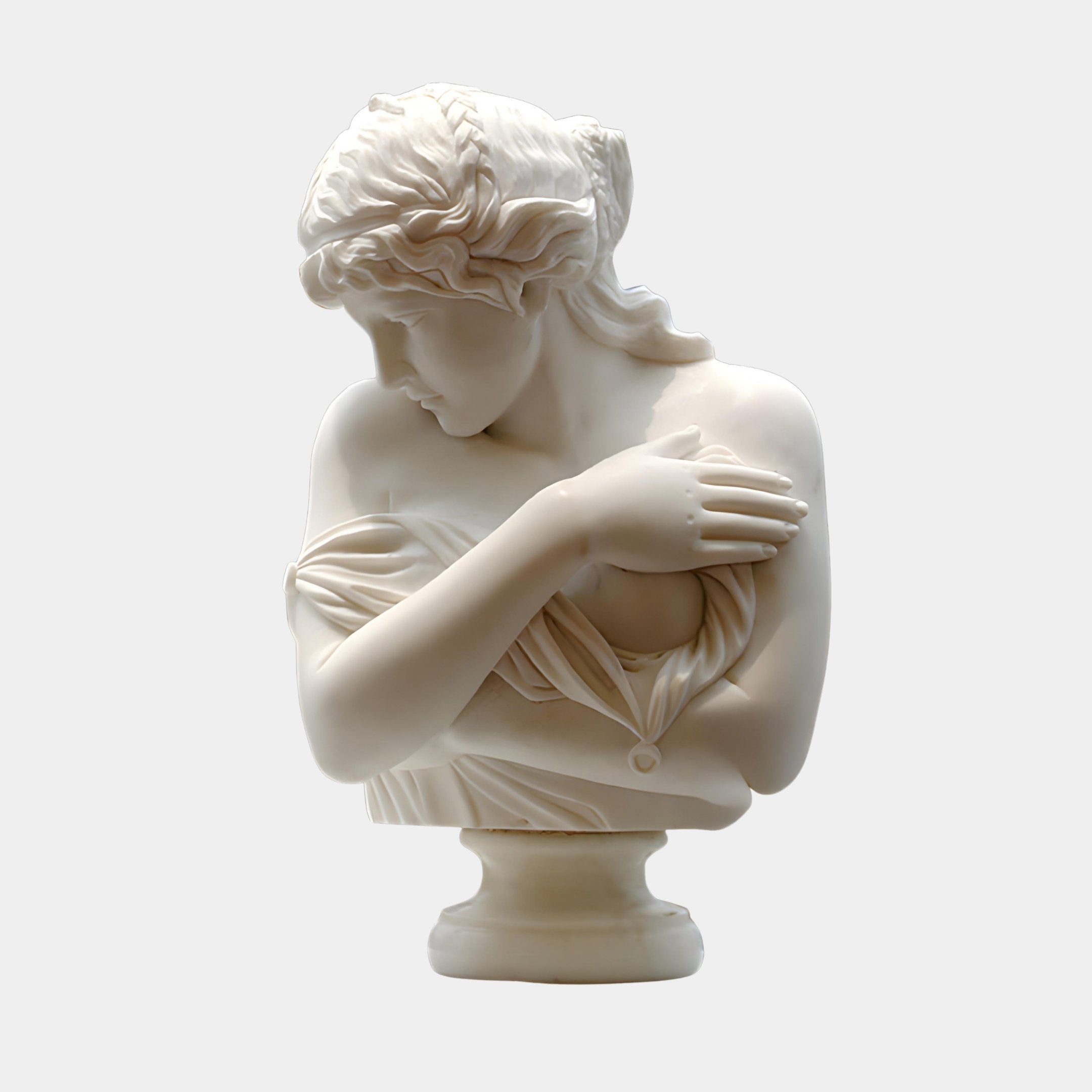 The Psyche Marble Bust Sculpture - 65cm by Giant Sculptures features a woman’s wavy hair, gazing down to her left and draped in a loose garment, elegantly posed on a pedestal in natural white marble.