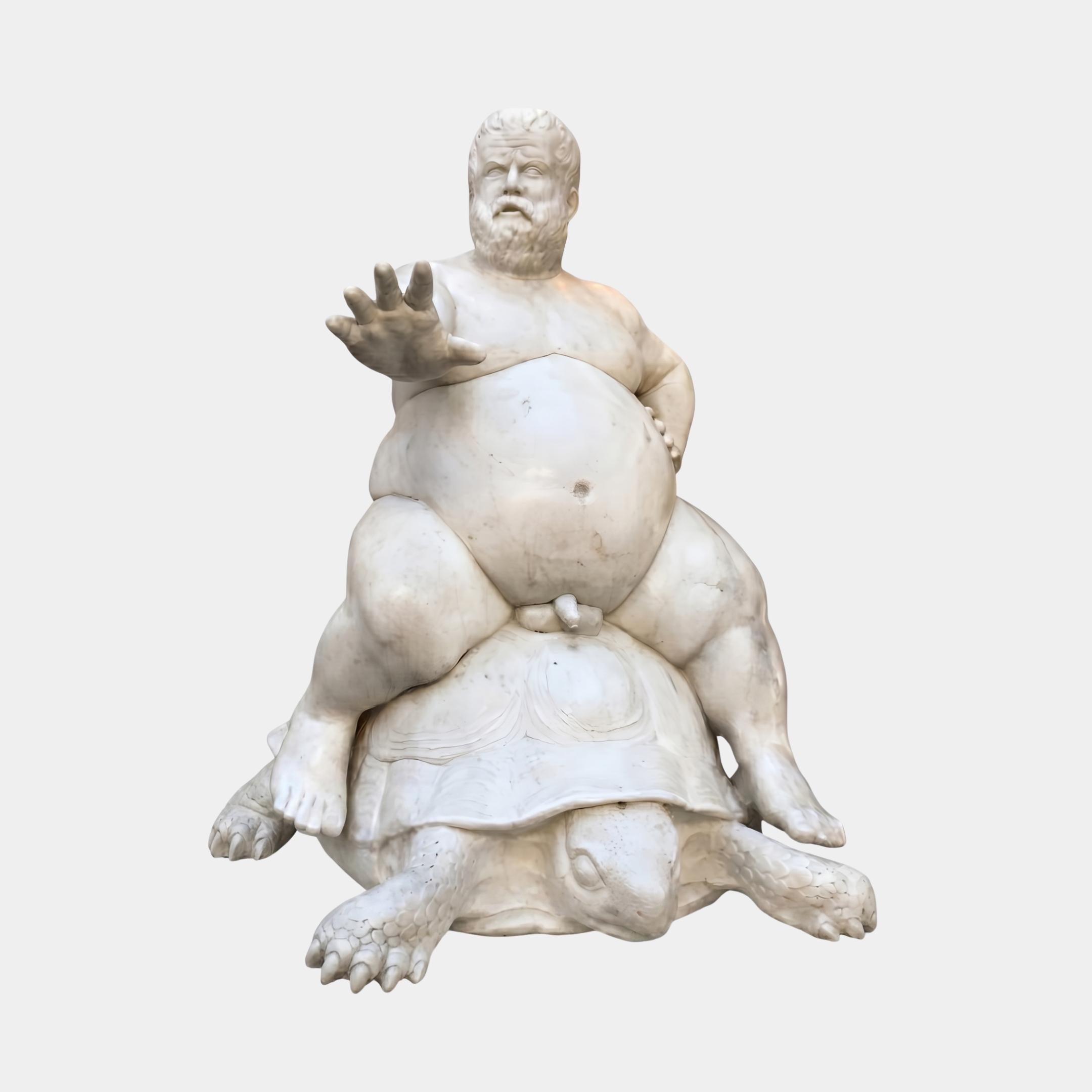 Cherub on Tortoise Marble Sculpture by Giant Sculptures, 100cm white marble figure of a bearded cherub with raised hand seated on a tortoise, plain background.