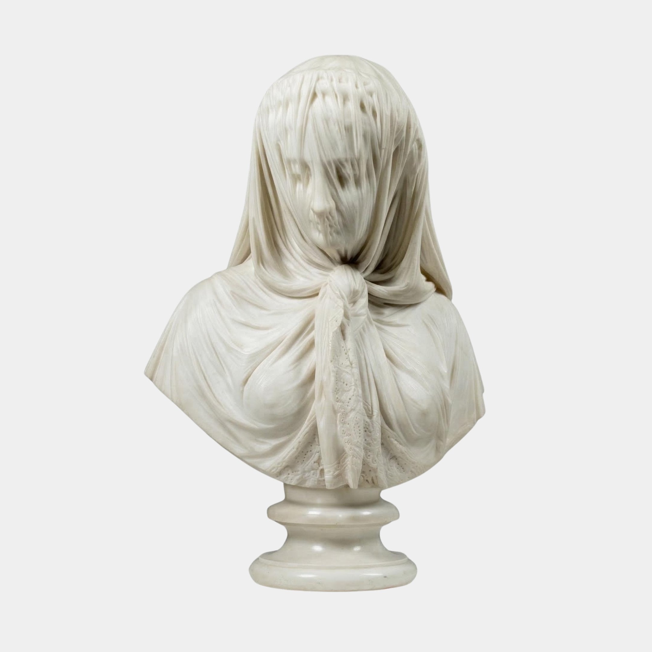 The Veiled Lady Marble Bust Sculpture (65cm) by Giant Sculptures features intricate carving, with delicate, translucent fabric draped over the woman's head and shoulders, highlighting fine folds and facial details.