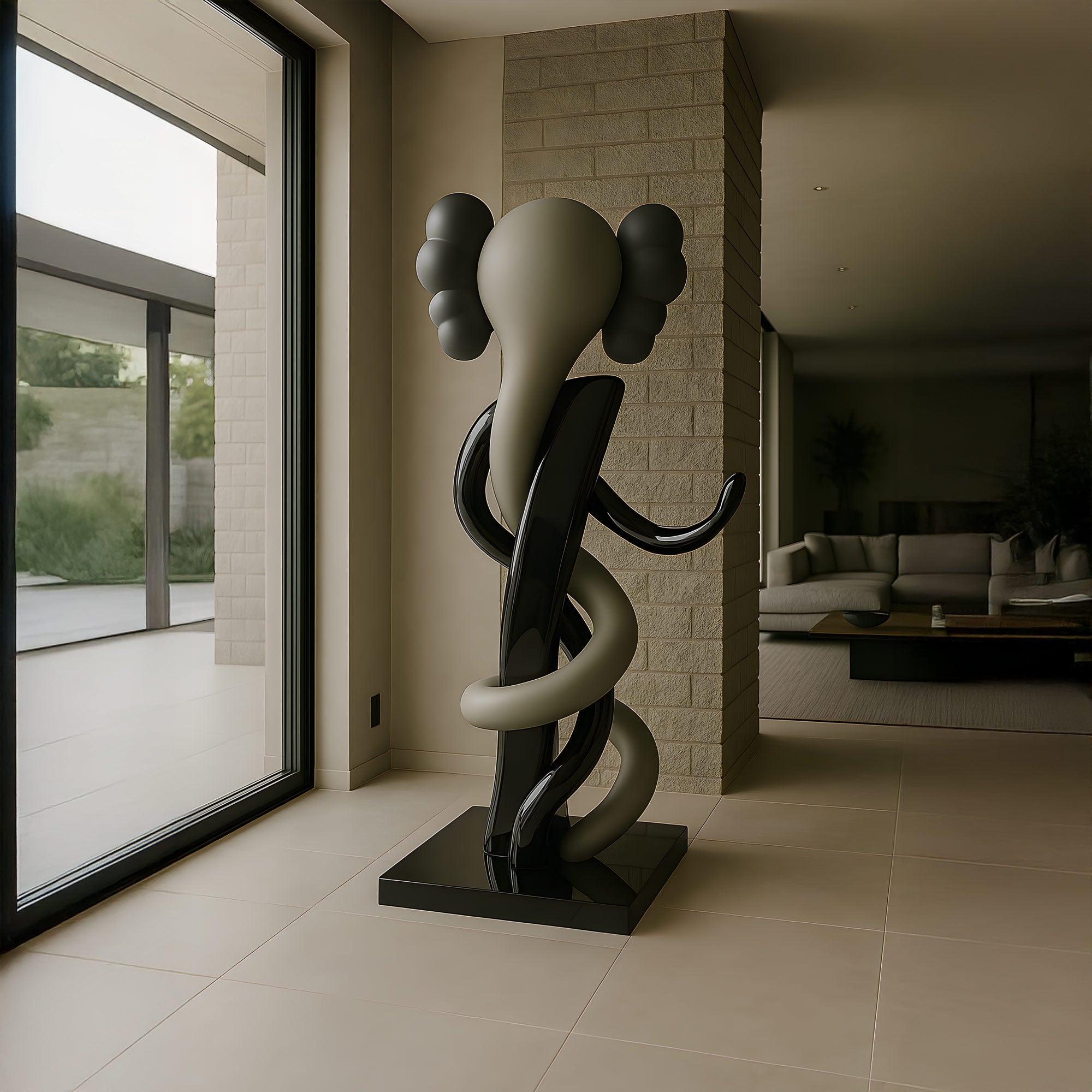 In a minimalist, light-filled room, the 176cm Ash Grey Iconify Snake Sculpture by Giant Sculptures stands elegantly on a polished floor near large windows. Its smooth, intertwining design and bulbous shapes evoke an abstract elephant, embodying contemporary minimalism.