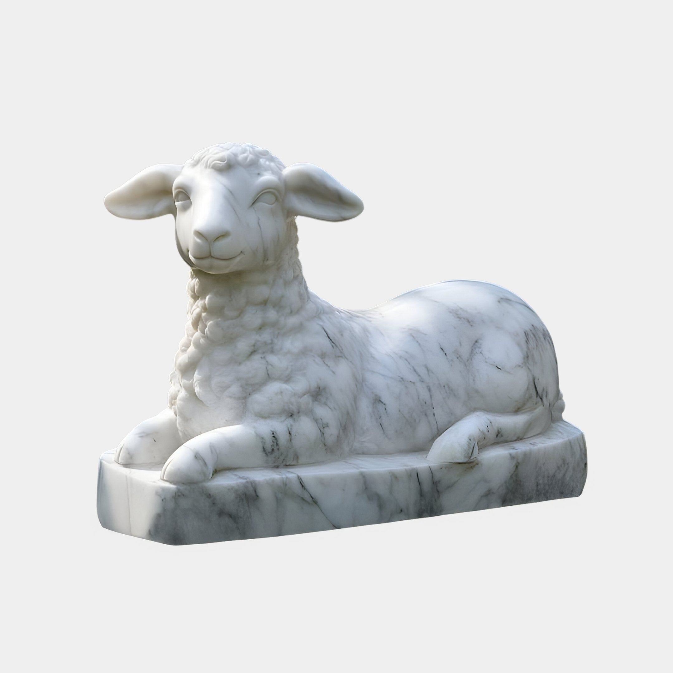The Resting Lamb Marble Outdoor Sculpture - 70cm by Giant Sculptures features detailed carving of a lambs curly wool on a rectangular base, perfect for charming garden decor and enhancing any outdoor sculpture display.