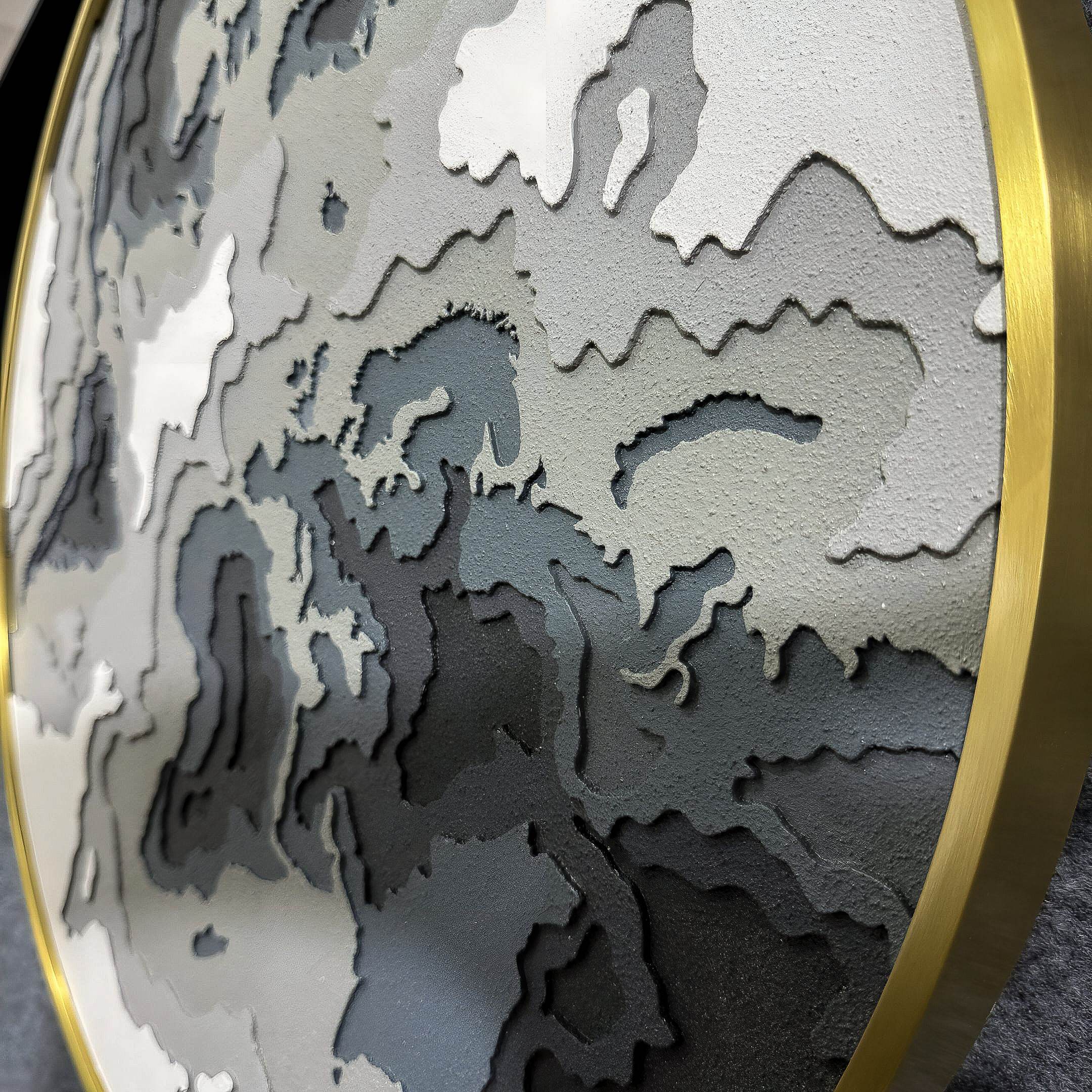 The Terranova Earth Green Round Wood Carving 3D Wall Art by Giant Sculptures features a layered, textured topographic design in shades of green, framed in a round gold border—bringing nature-inspired style to any room.