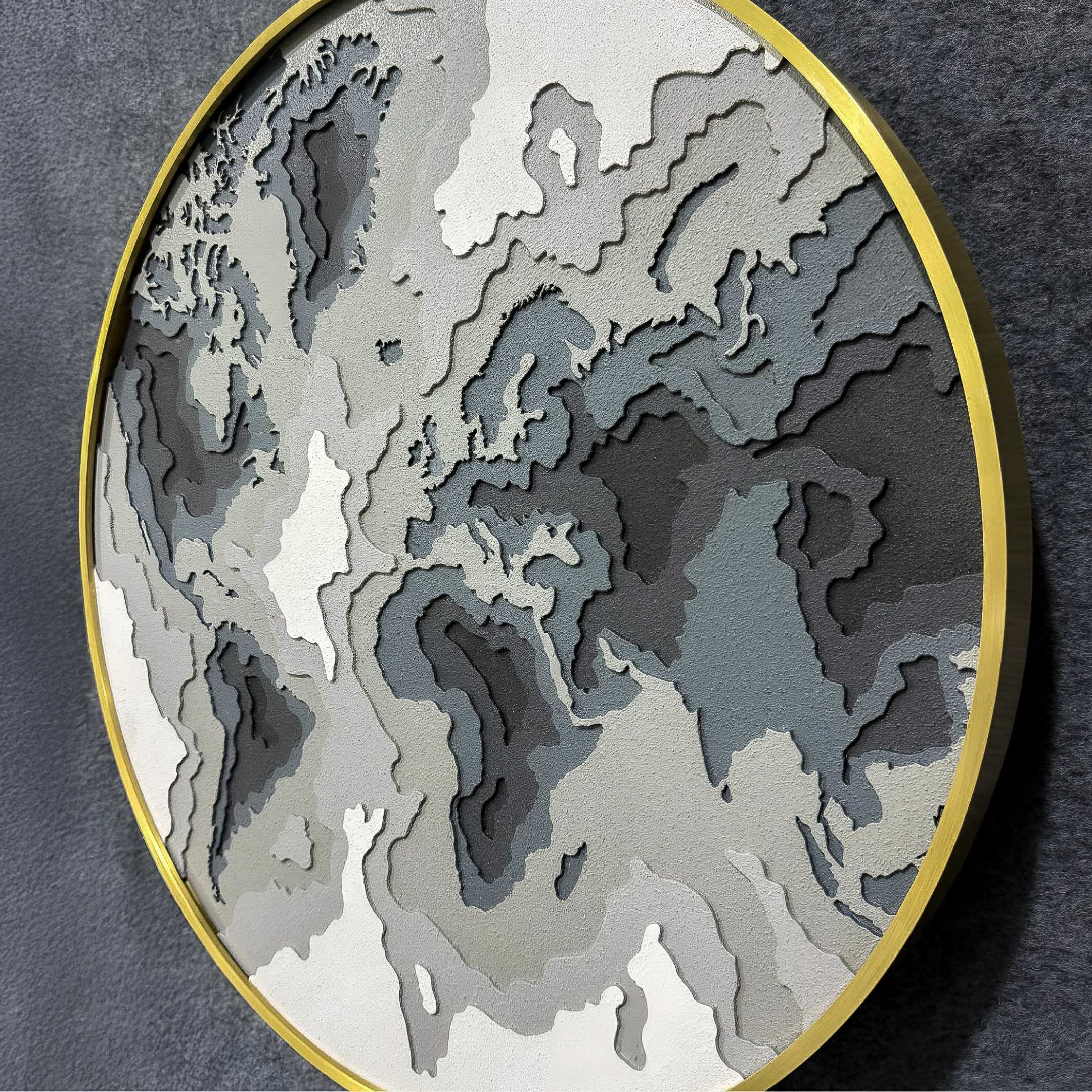 The Terranova Earth Green Round Wood Carving 3D Wall Art by Giant Sculptures features layered cutouts in earth tones with a thin gold frame, offering a striking, nature-inspired design for your wall.