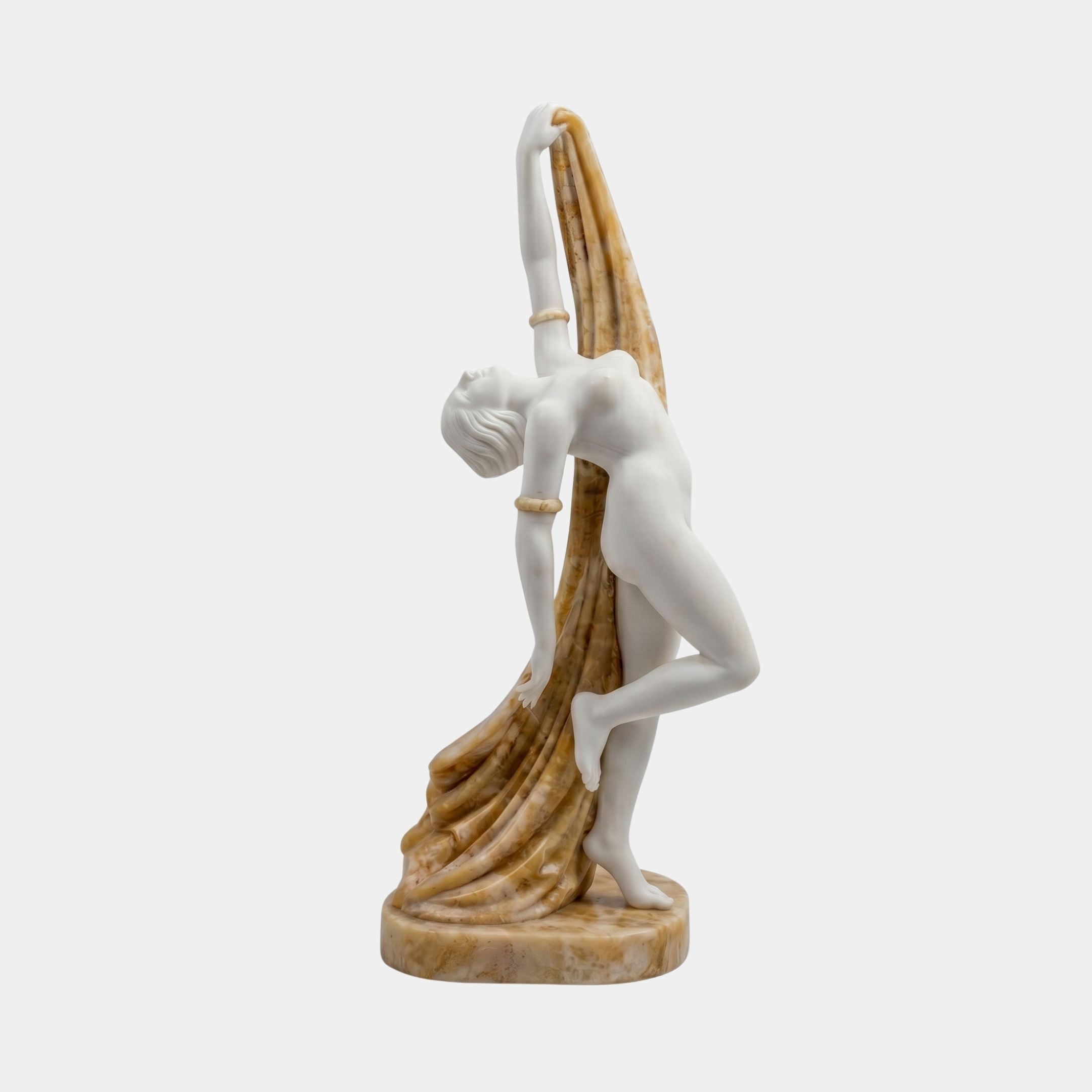 Dancing Goddess Marble Sculpture by Giant Sculptures, 160cm, white nude figure arching back with brown flowing drapery held overhead, on a round marble base.