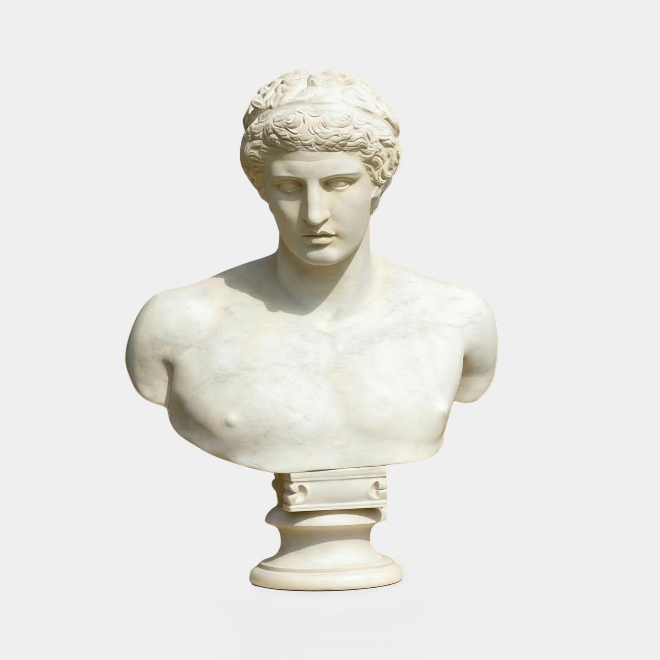 The Classical Male Marble Bust Sculpture - 75cm by Giant Sculptures features a white marble bust of an ancient male with curly hair and detailed facial features, displayed on a simple pedestal against a plain background.