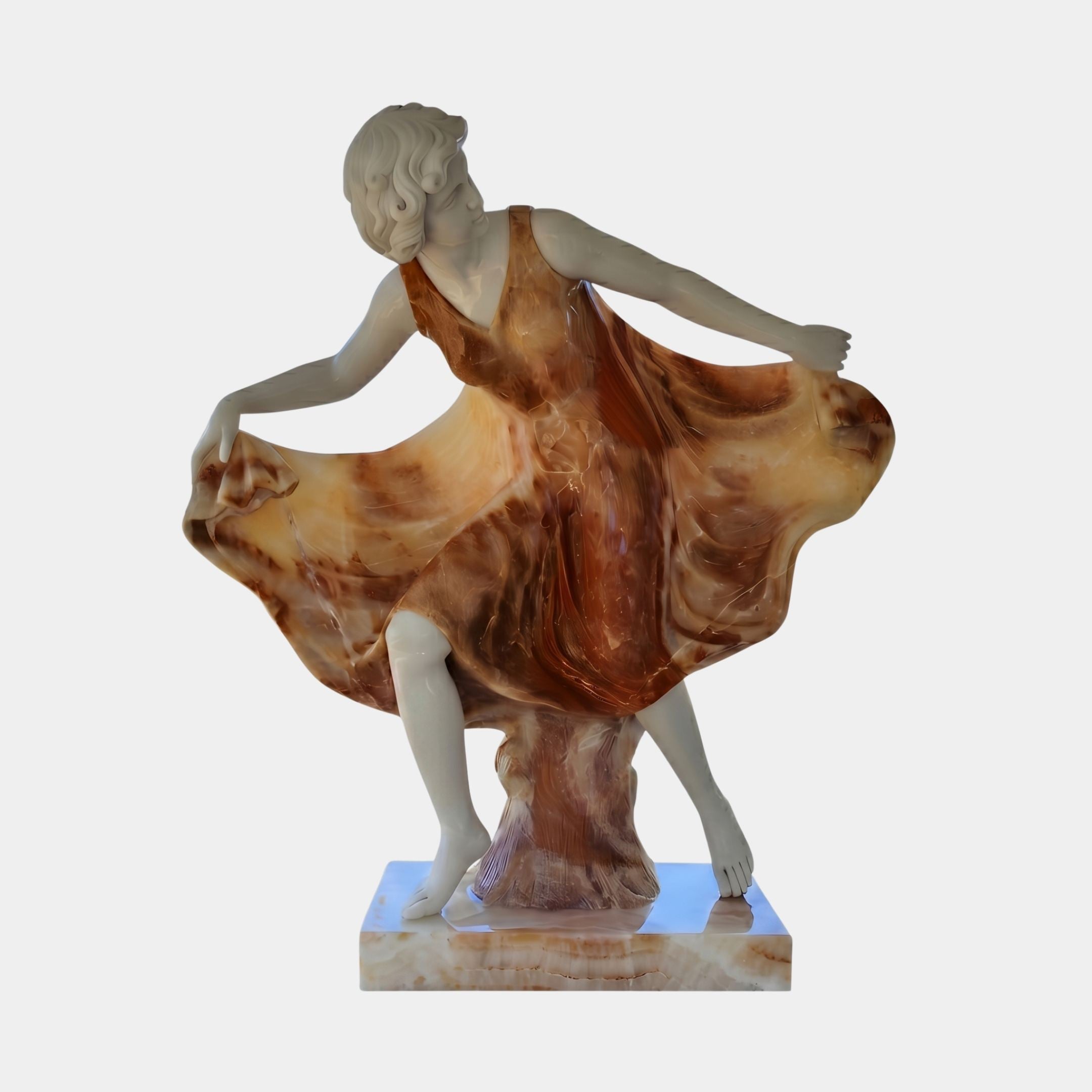 Dancing Woman Marble Sculpture by Giant Sculptures, 120cm, depicting a figure in white marble lifting a swirling brown and amber dress, on a pale base.