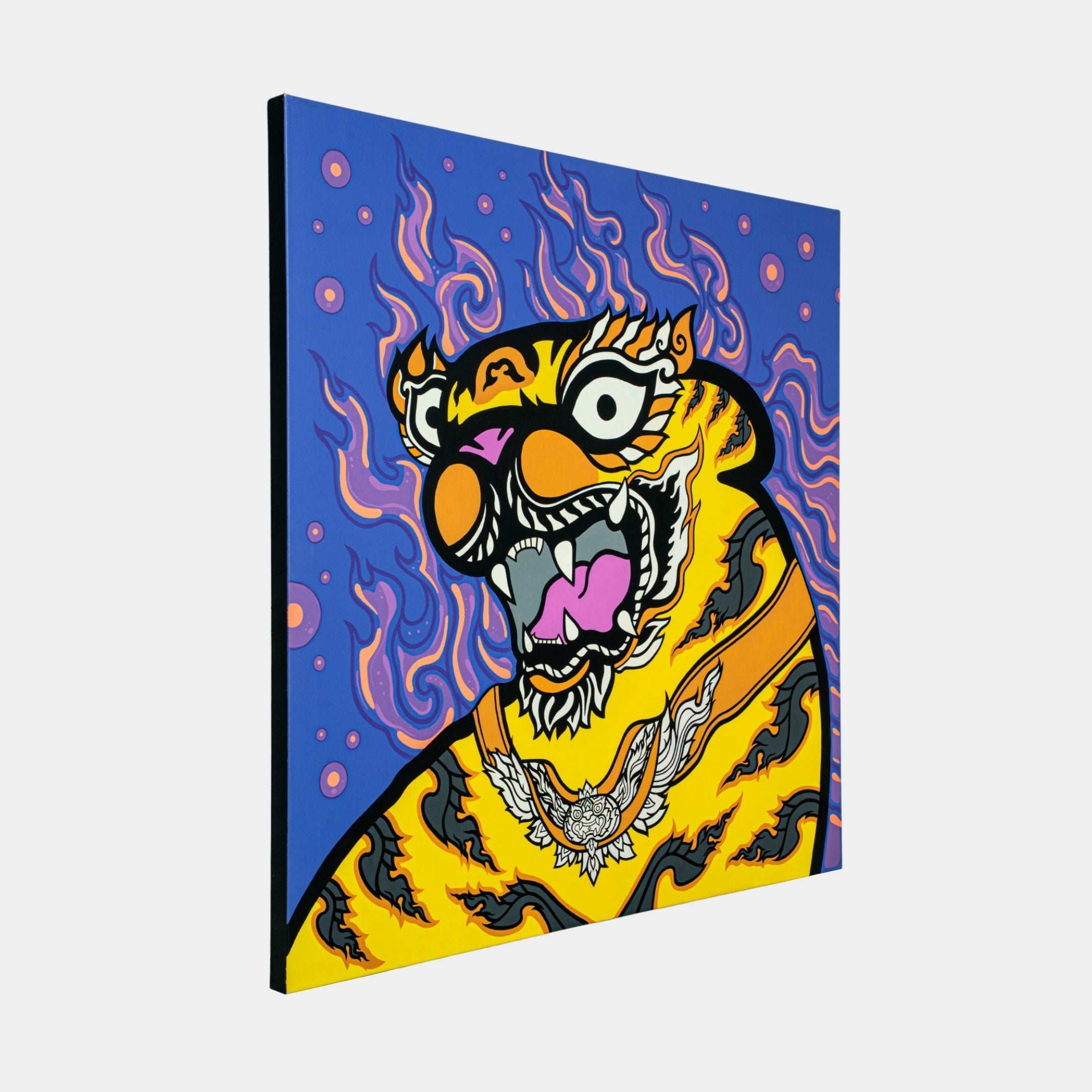 The Thai Tiger Pop Art Canvas Painting by Giant Sculptures features a stylized, roaring tiger with bold orange and black stripes, large white eyes, and an open mouth. Set against a blue background with purple flames and pink circles, it captures the essence of vibrant pop art.