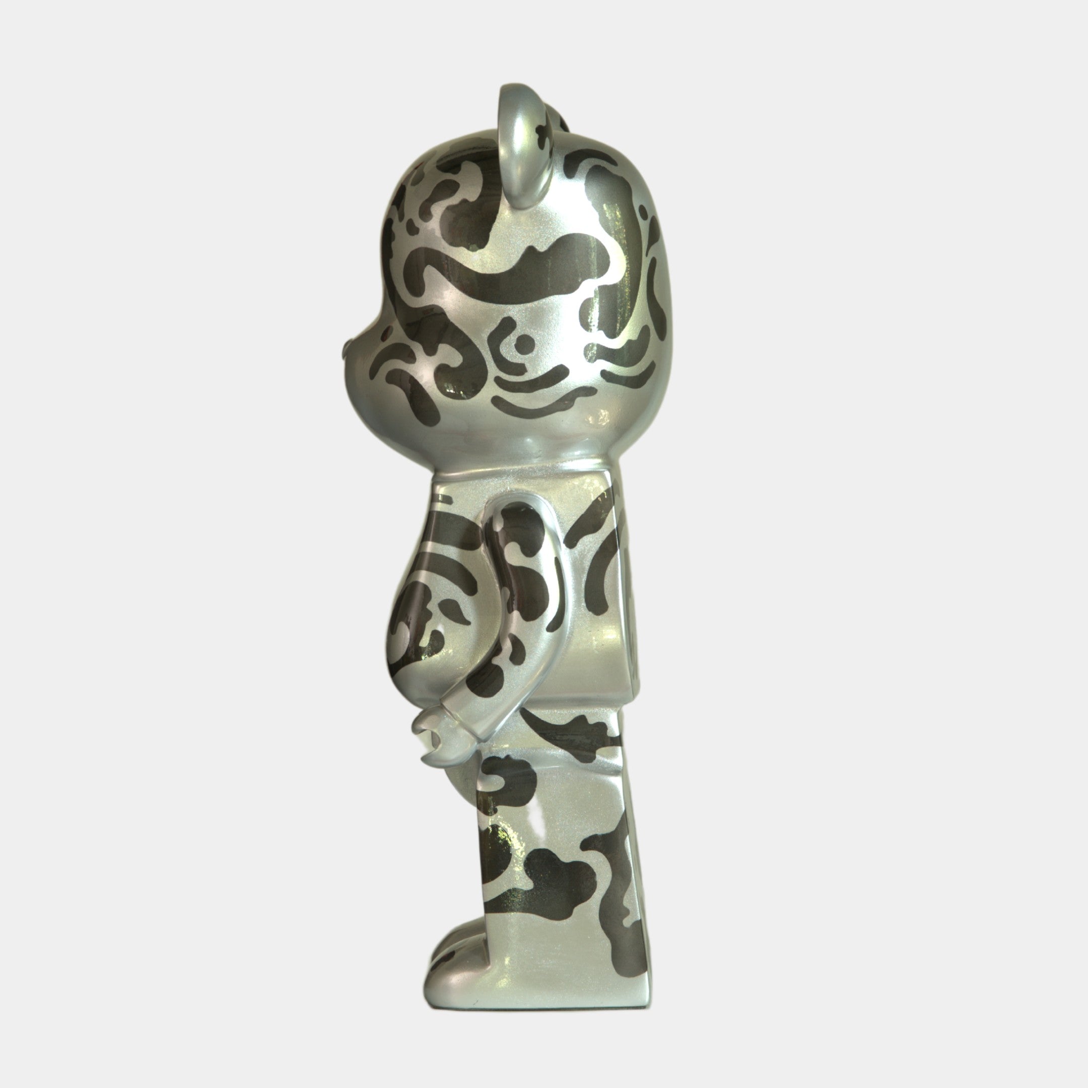 The Inside Appears Outside 3 Bear Sculpture (135cm) by Giant Sculptures features a hand-painted silver finish with abstract black patterns, shown upright in profile against a plain white background.