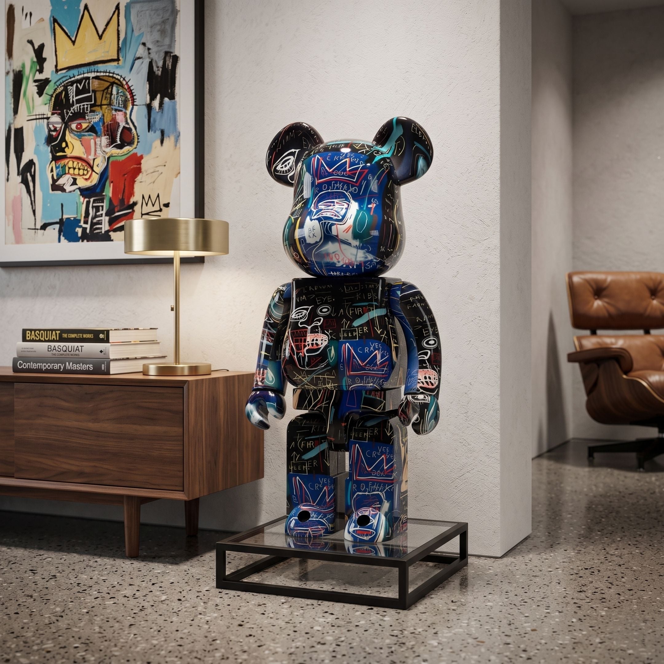 Abstract Graffiti Bear Sculpture - 70cm by Giant Sculptures, blue and black graffiti-patterned resin bear on a glass stand, displayed in a living room near a leather chair and wall art.