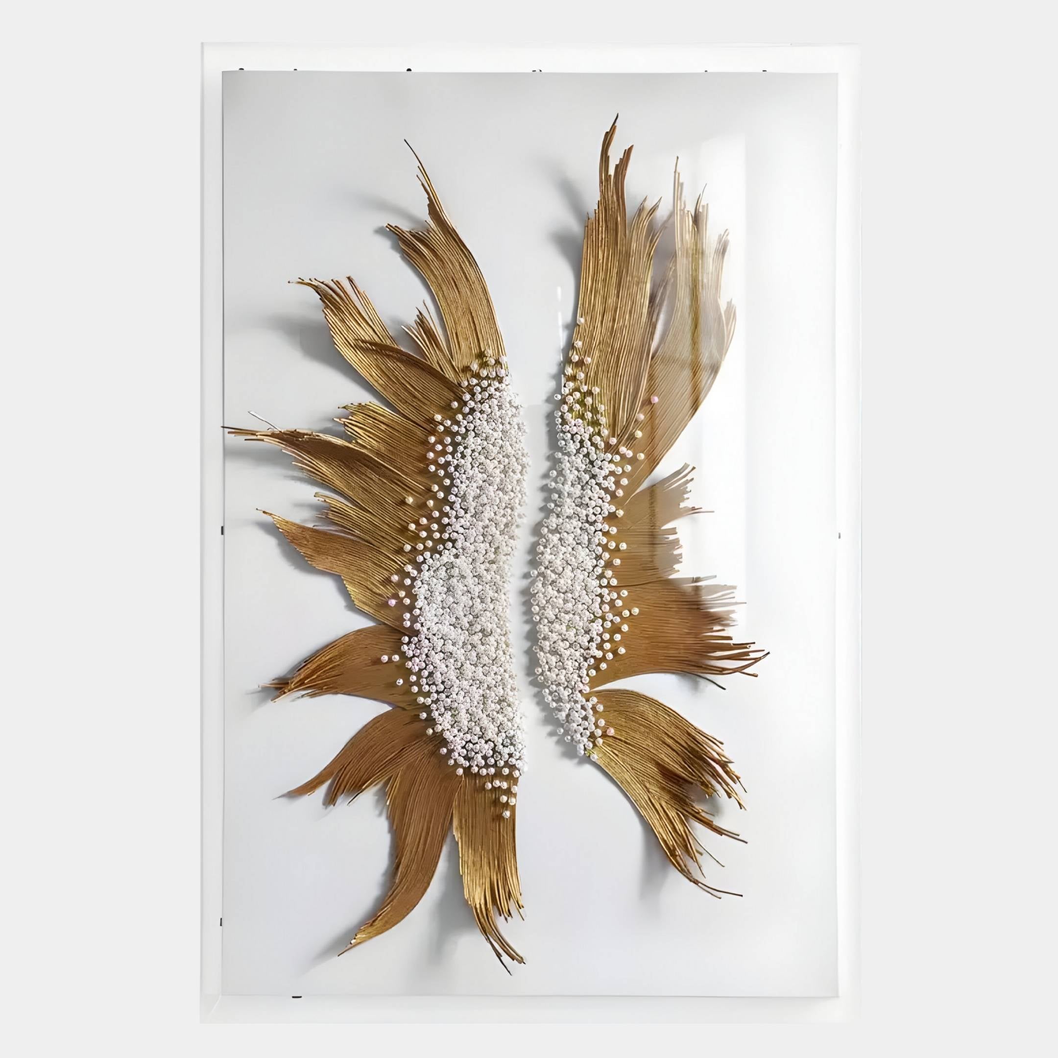 The Lirien Twin Pearl Fronds Gold Sculptural 3D Wall Art by Giant Sculptures features two abstract golden feather-like shapes with textured white bead centers on a white background—ideal for contemporary wall decor.