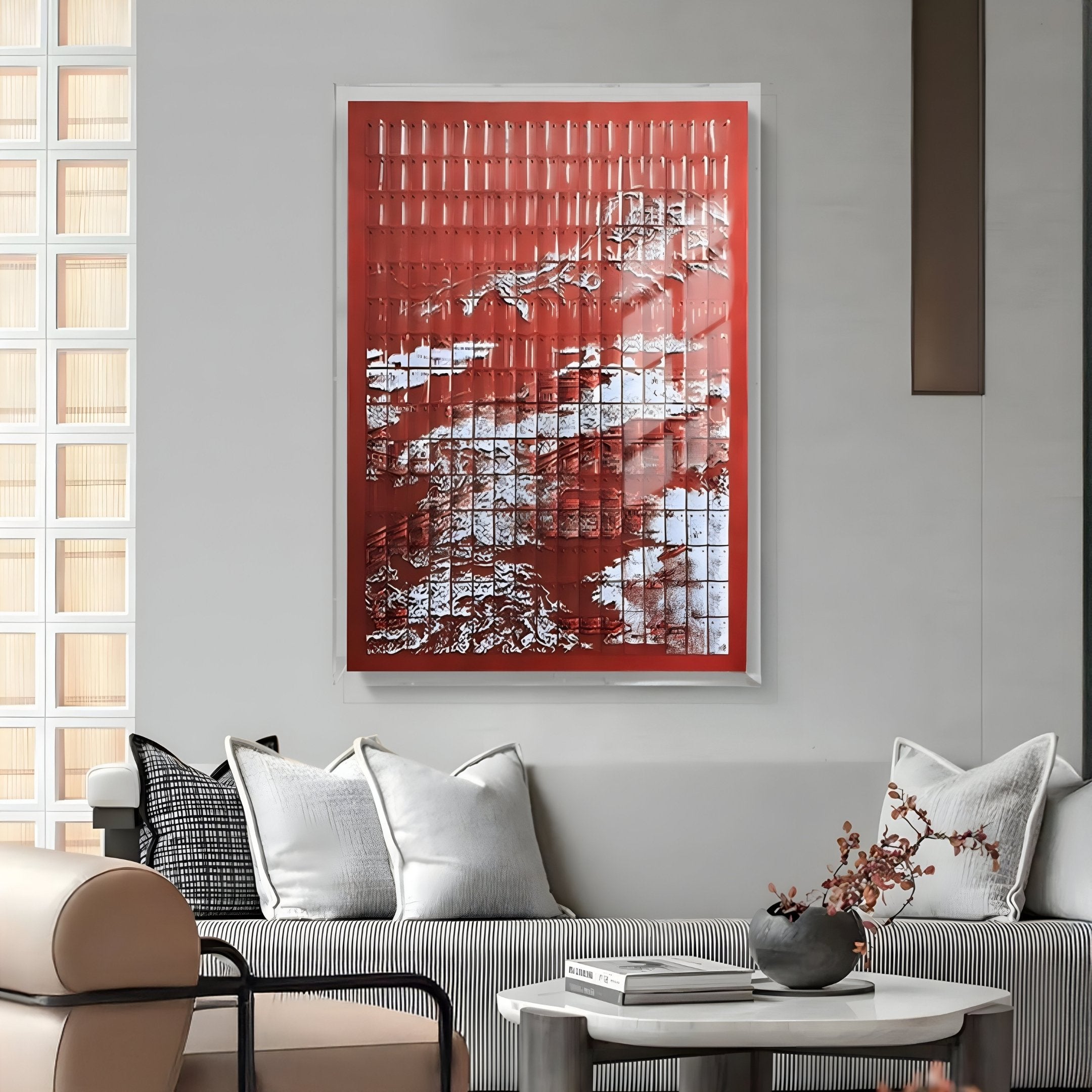 A modern living room features a white sofa, neutral cushions, a glass coffee table with a decorative branch, and the Dynasty Crimson Peaks Acrylic 3D Wall Art by Giant Sculptures as striking contemporary decor above the seating area.
