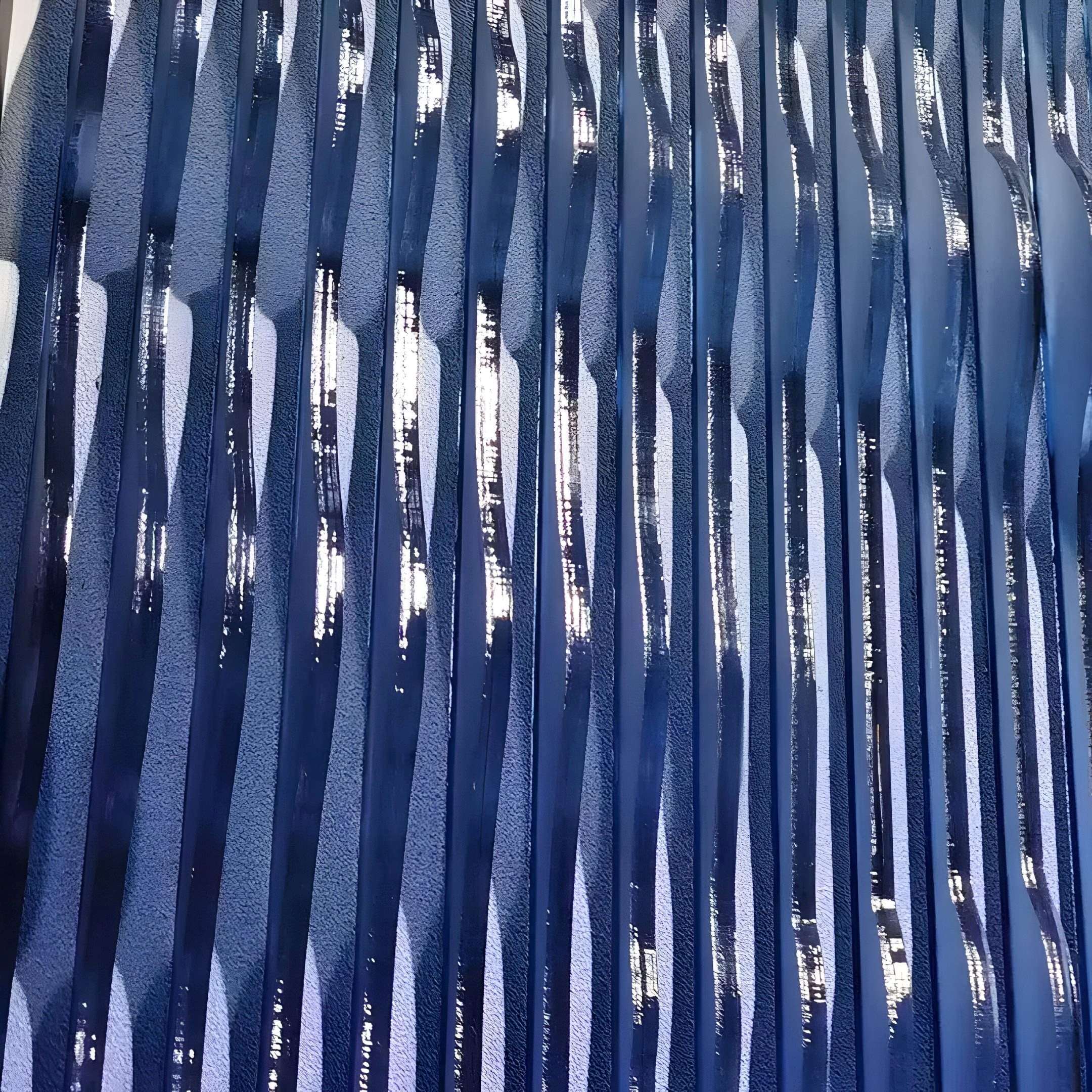 Close-up of Giant Sculptures Current III Navy Sky & Icy White Acrylic 3D Wall Art, featuring a textured blue surface with glossy, wavy ridges that create dynamic reflections—ideal as modern sculptural wall art for any space.