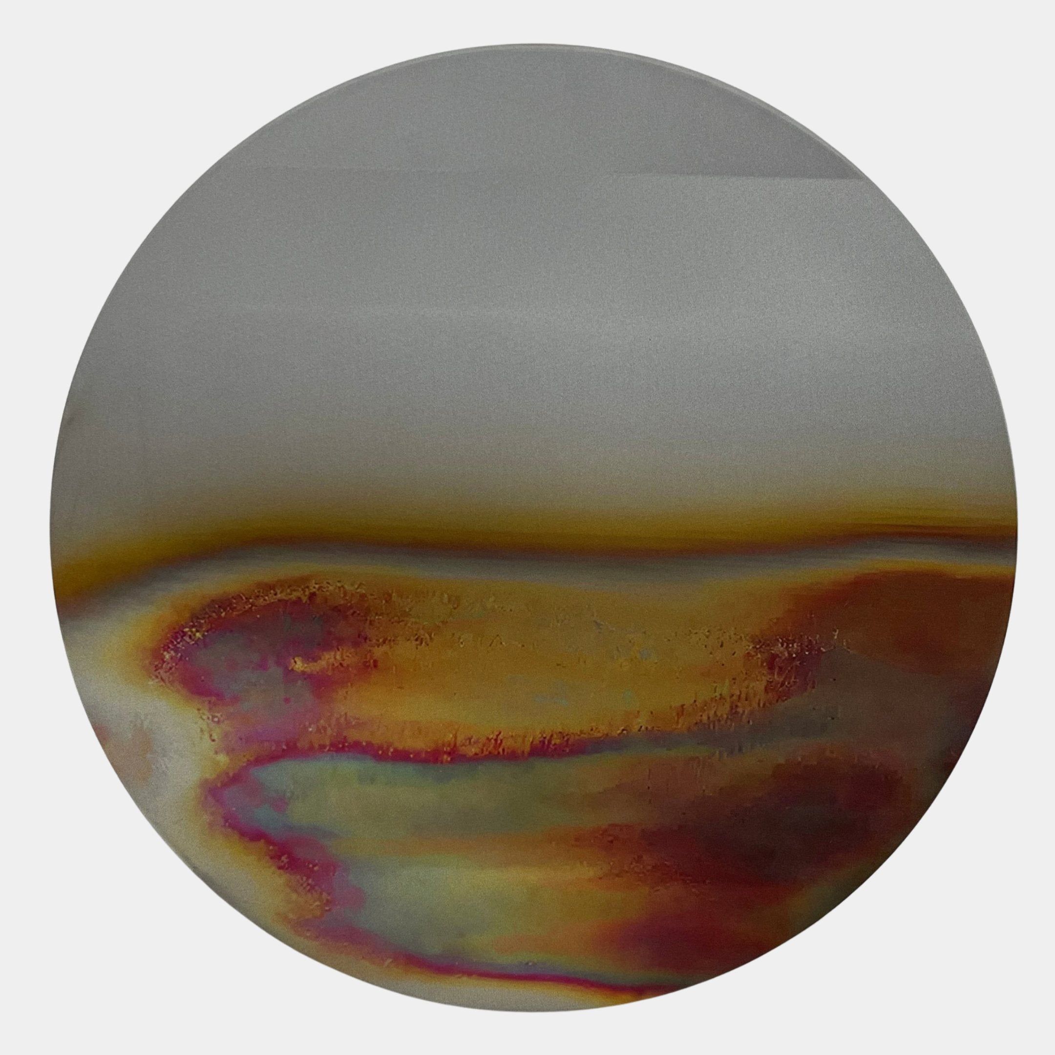 Iridia Halo I Abstract Acrylic UV Wall Art by Giant Sculptures, a circular high-gloss disc with iridescent gold, copper, pink, and green halo on grey.