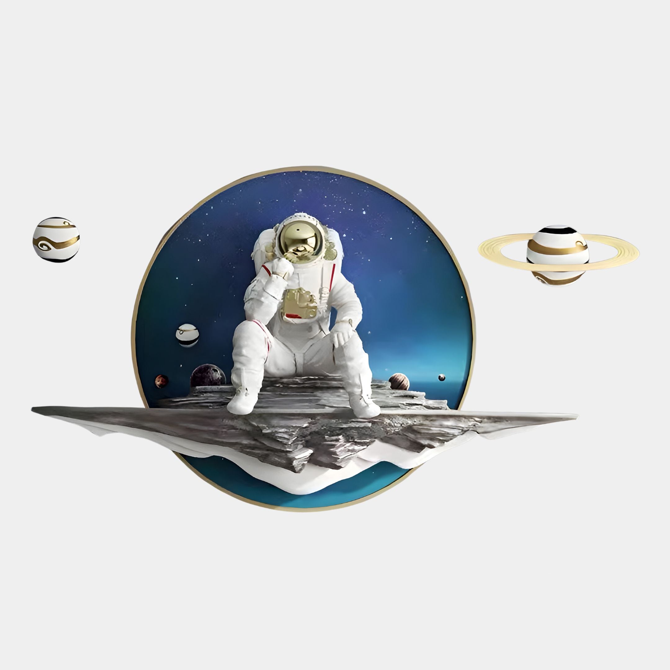 An astronaut sits on a floating rock in space, holding a mug. The Giant Sculptures White 3D Galaxy Astronaut Thinker Round Wall Art features ringed planets and stars set against a deep blue cosmic backdrop.