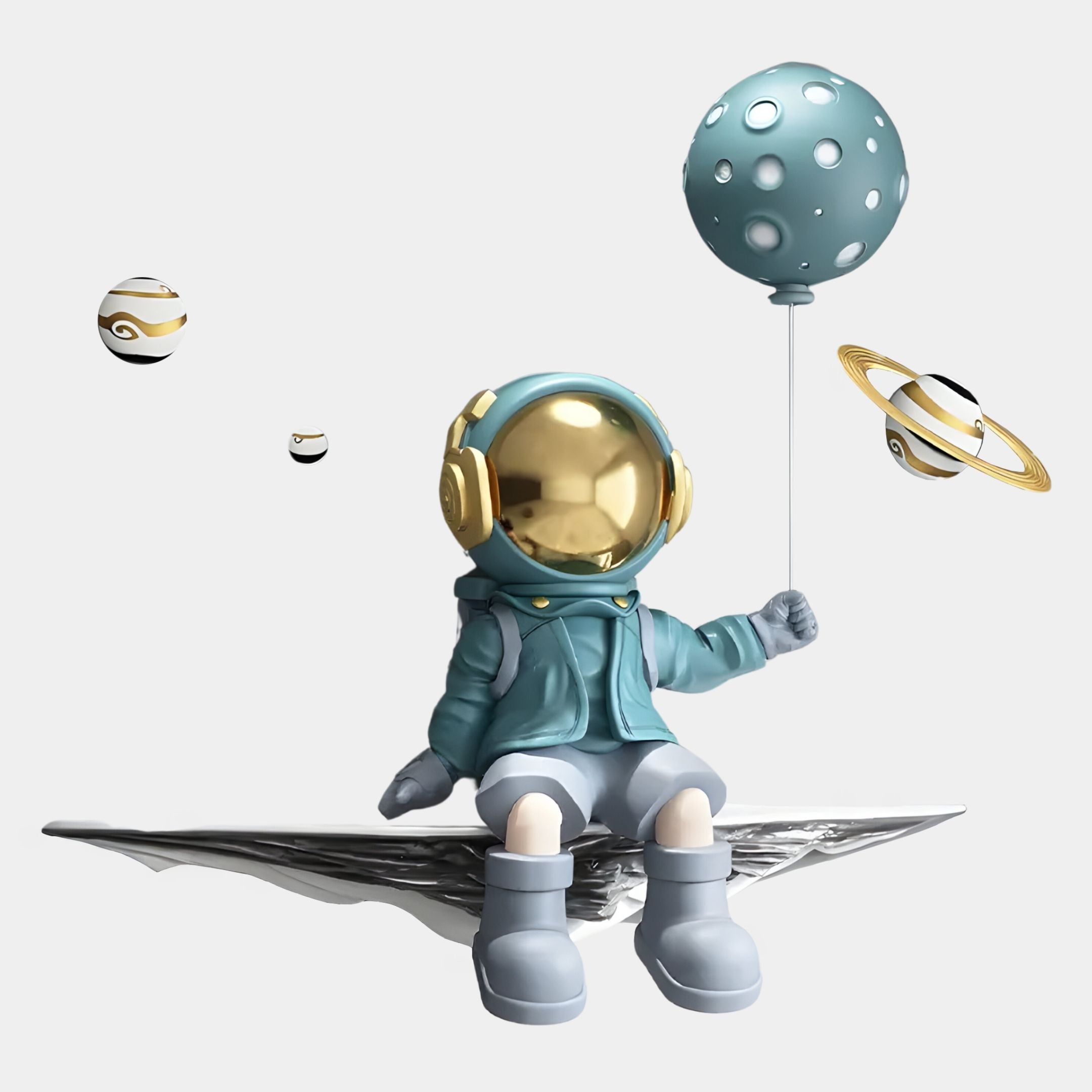 The Blue 3D Dreamer Balloon Astronaut Wall Art by Giant Sculptures features a resin astronaut with a gold visor on a metallic platform, holding a teal balloon with decorative planets, perfect for adding cosmic charm to any space.