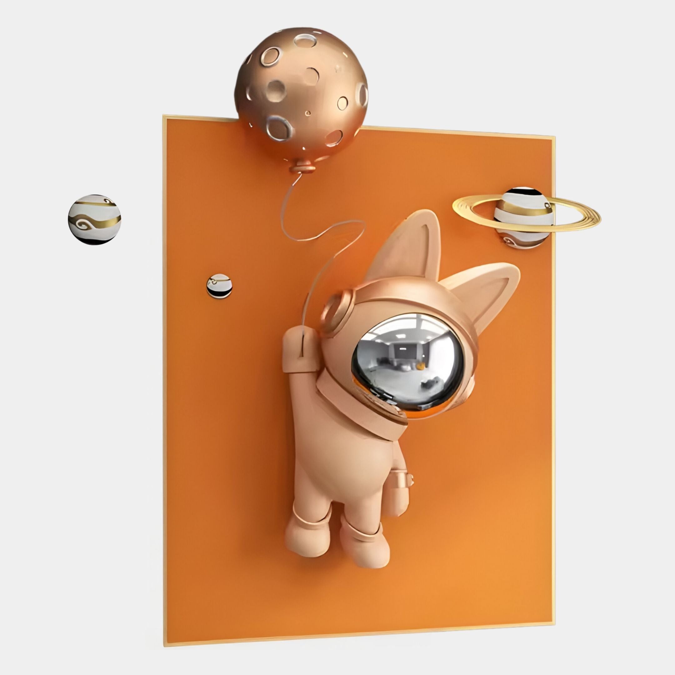 The Rose Gold 3D Astronaut Bunny Balloon Orange Wall Art by Giant Sculptures features a bunny in a shiny space helmet floating before an orange panel, with planet balloons and orbiting moons for a cosmic wall effect.