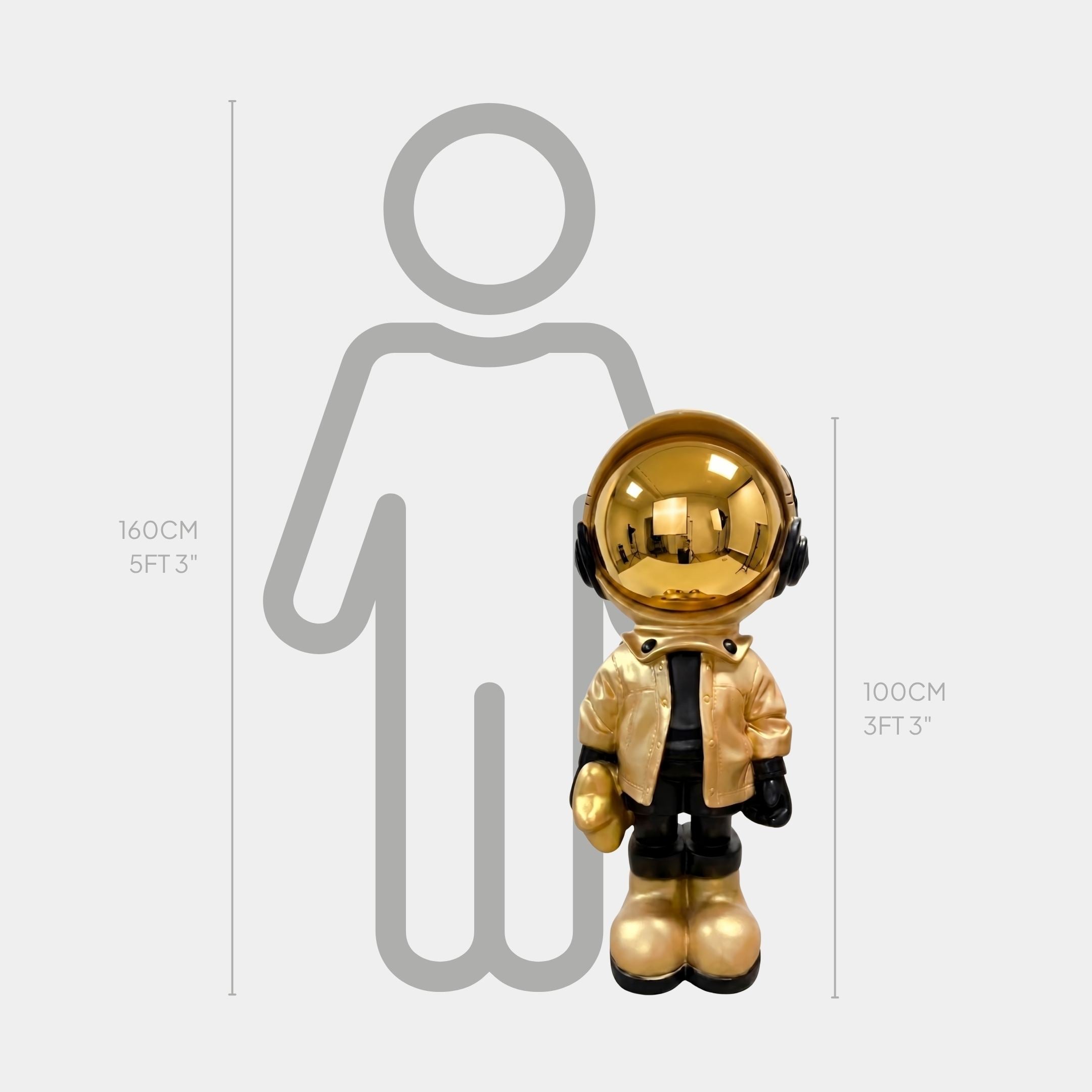 Celestial Gold Astronaut Beats Sculpture by Giant Sculptures shown at 100cm beside a 160cm human silhouette for scale, in gold and black with headphones.
