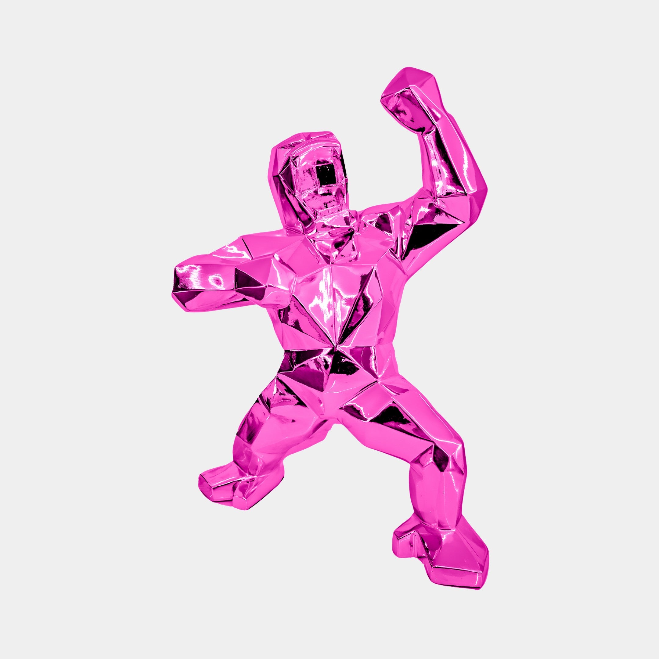 The Flamingo Pink Gorilla Sculpture by Giant Sculptures is a 50cm abstract polygonal art piece. Crafted from premium resin, its glossy finish and geometric design create a futuristic look, making it a standout masterpiece against a white background.