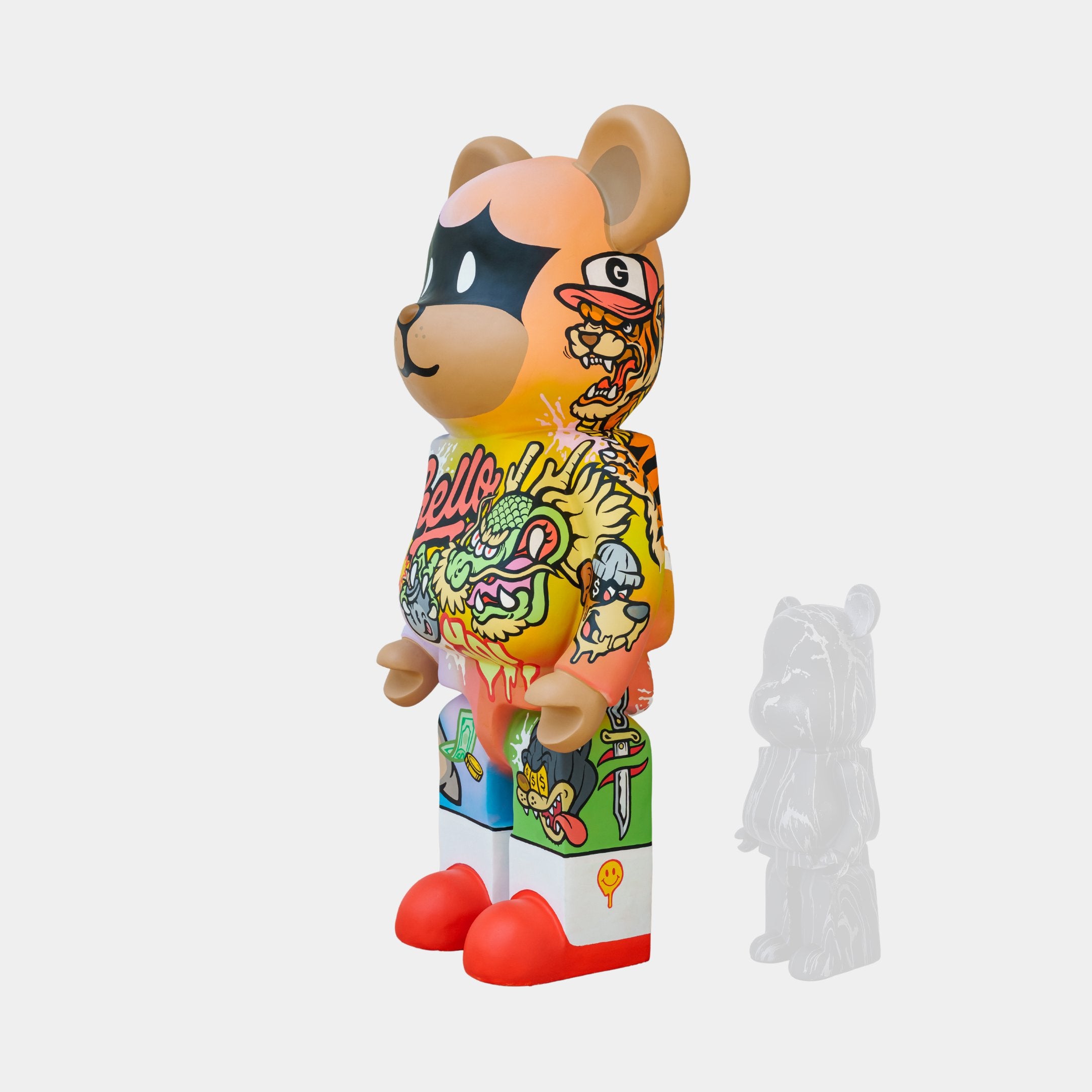 The 135cm Lucky Paws Bear Sculpture by Giant Sculptures is a vibrant bear figurine with street art, featuring graffiti-style shapes and characters. It has red shoes and includes a smaller translucent version, symbolizing prosperity and protection with its bold design.