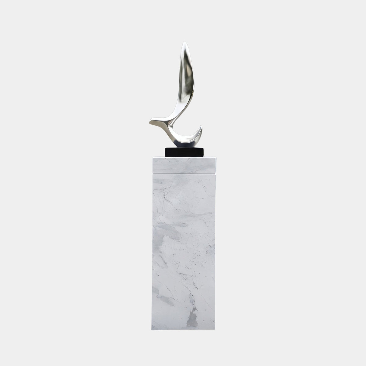Ashfield Black & White Abstract Sculpture, a mirror-finish flame-like form on a black base atop a marble plinth, 80cm tall, plain light grey background.