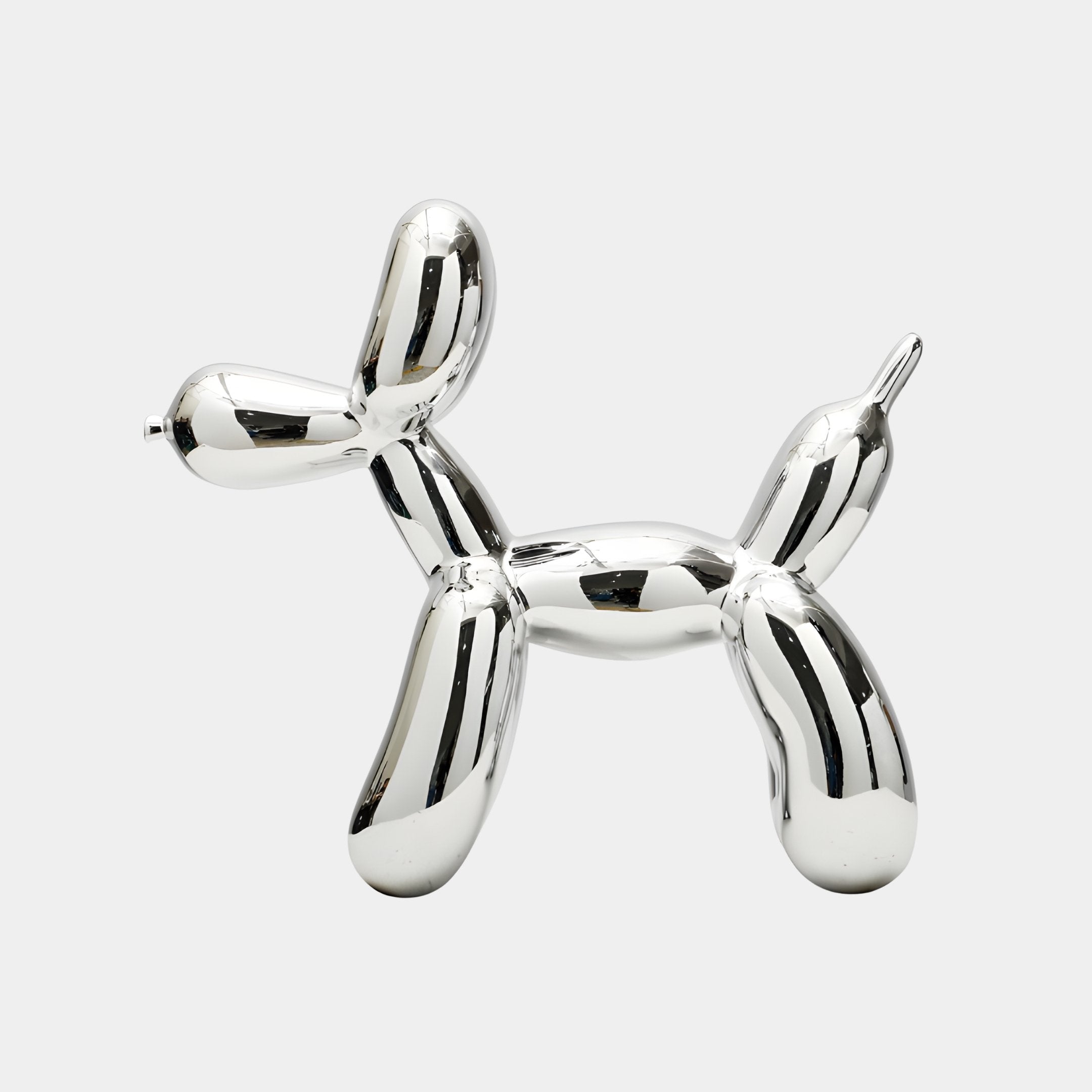Bramhall Silver Balloon Dog Sculpture, 54cm mirror-finish chrome fibreglass dog figure on a plain white studio background.