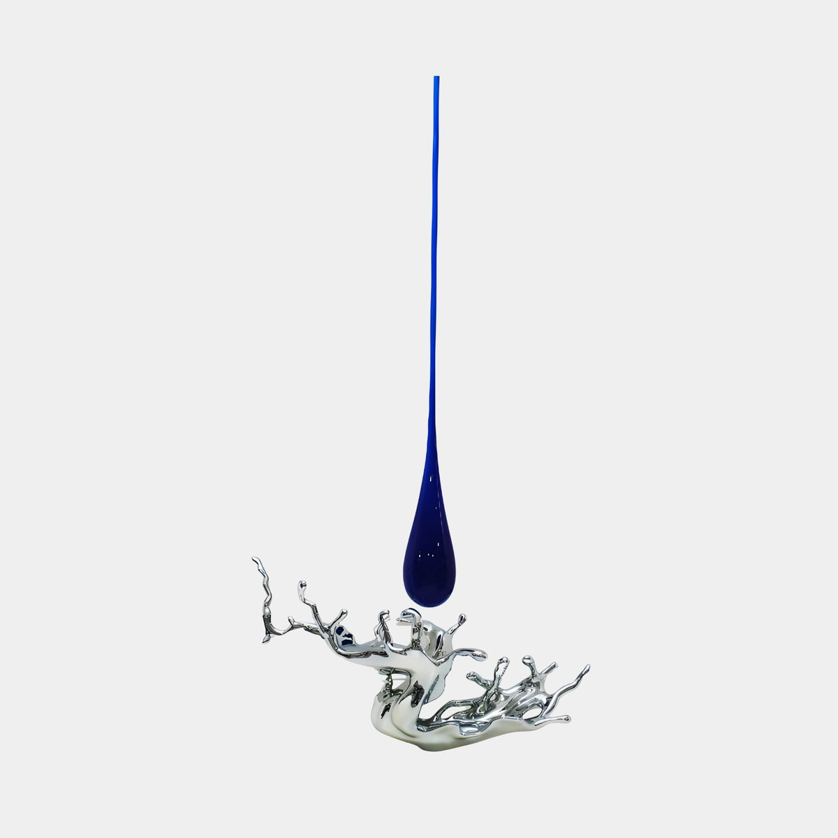 Bramland Silver Water Splash Sculpture - 222cm, a mirror-finish silver fibreglass splash form with a blue teardrop suspended above, shown on a plain white background.