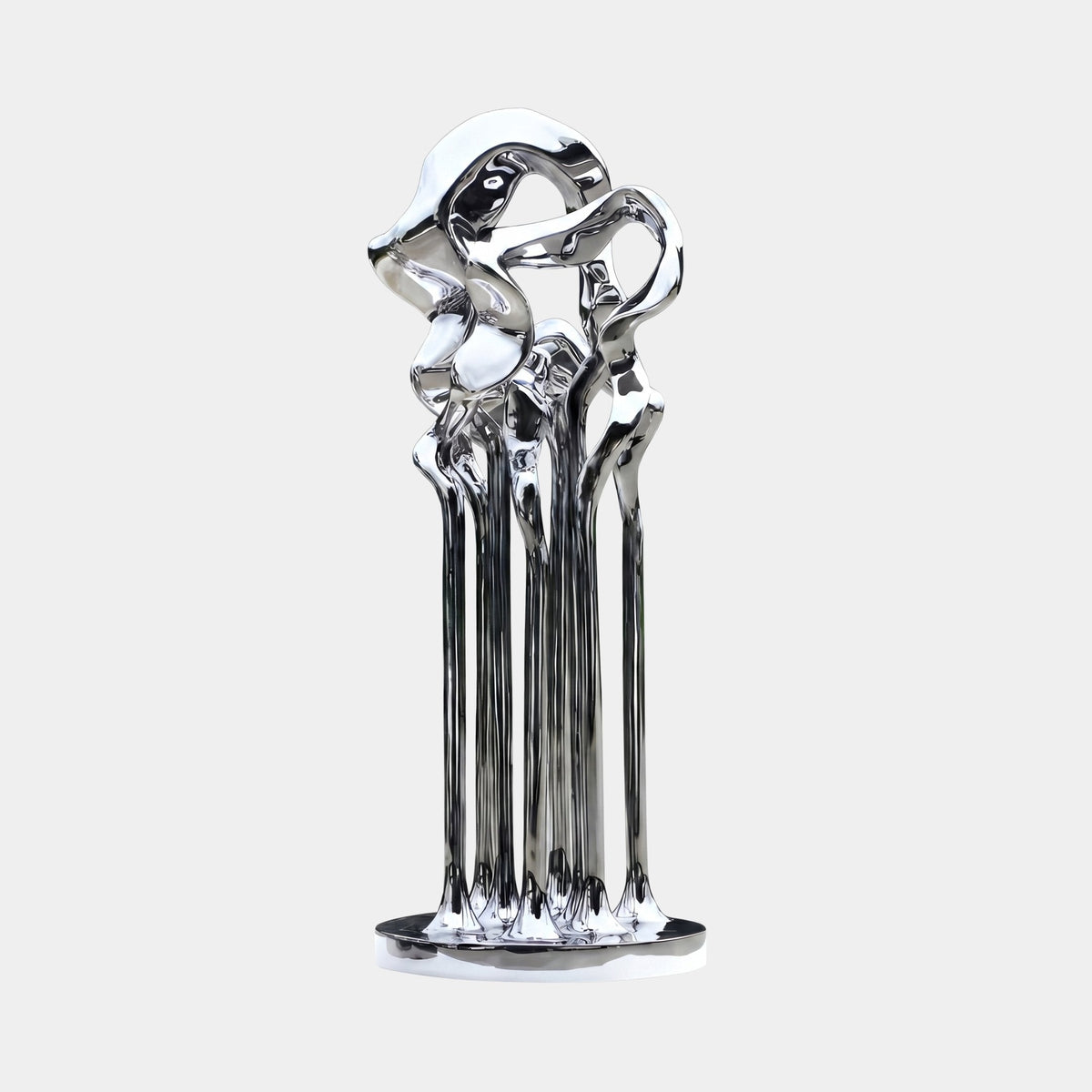 Brookwick Silver Abstract Sculpture - 180cm, a mirror-finish chrome fibreglass cluster with flowing vertical forms on an oval base, set against a plain light grey background.