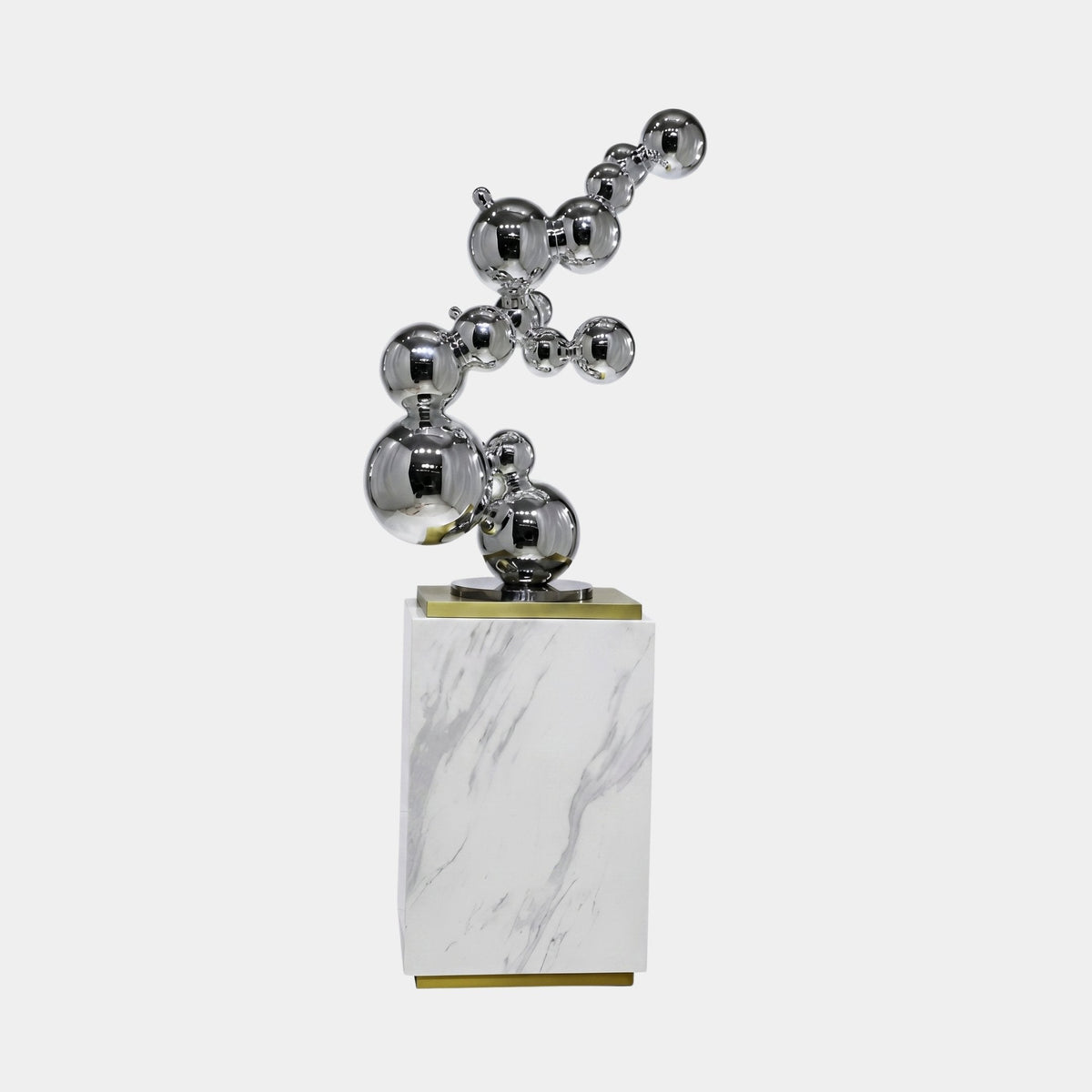 Brookstow Silver Abstract Sculpture, 162cm, chrome-silver spheres cascading upward on a marble base, plain white background.