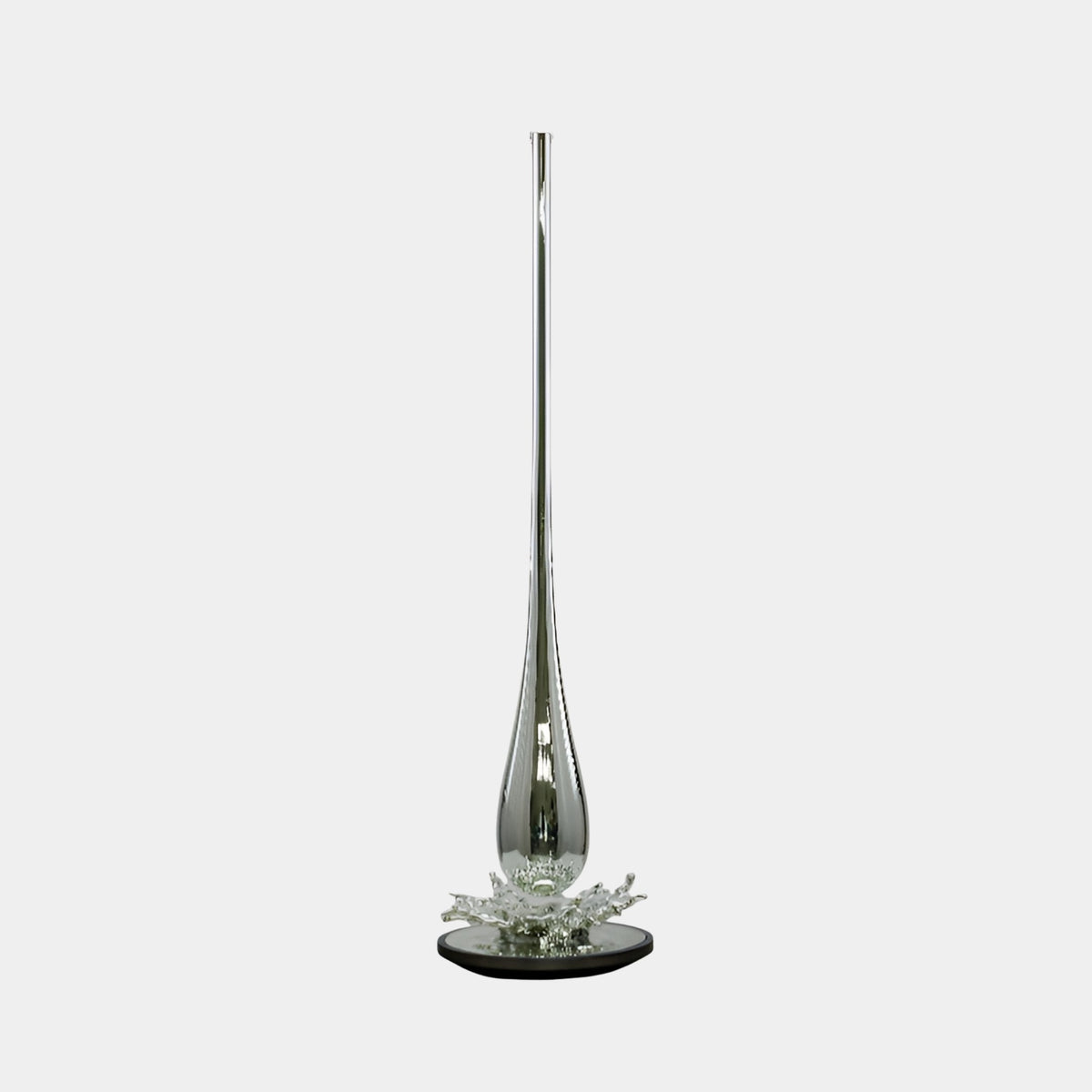 Caldlow Silver Abstract Sculpture (178cm), a tall silver fibreglass spike form on a round base with clear crystal accents, shown against a plain light background.