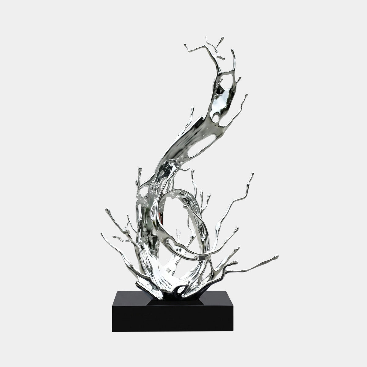 Caldbrook Silver Splash Sculpture - 180cm, a chrome-silver abstract fibreglass form on a black rectangular base, set against a plain light grey background.