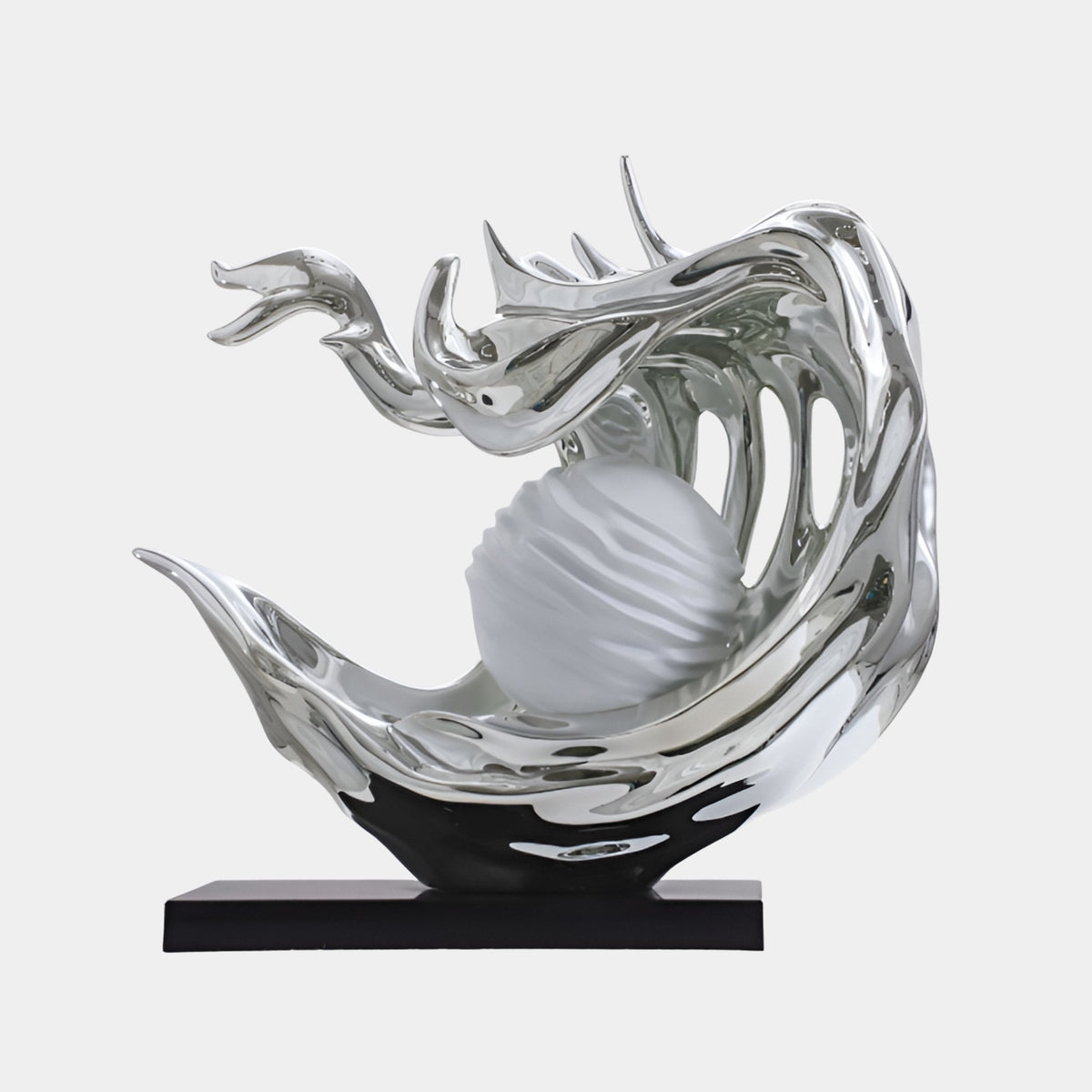 Dunworth Silver Splash Sculpture - 85cm, a chrome-silver fibreglass wave form with a frosted white sphere, mounted on a black base against a plain white background.