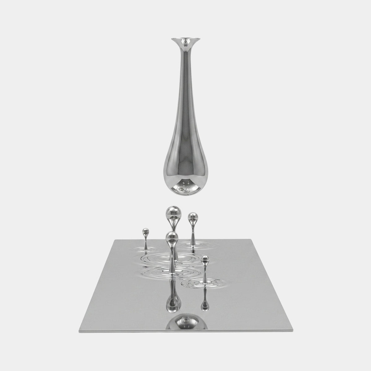 Dunwick Silver Abstract Sculpture, 257cm, showing a mirror-bright chrome teardrop form suspended above a reflective platform with smaller droplet accents, set against a plain white background.