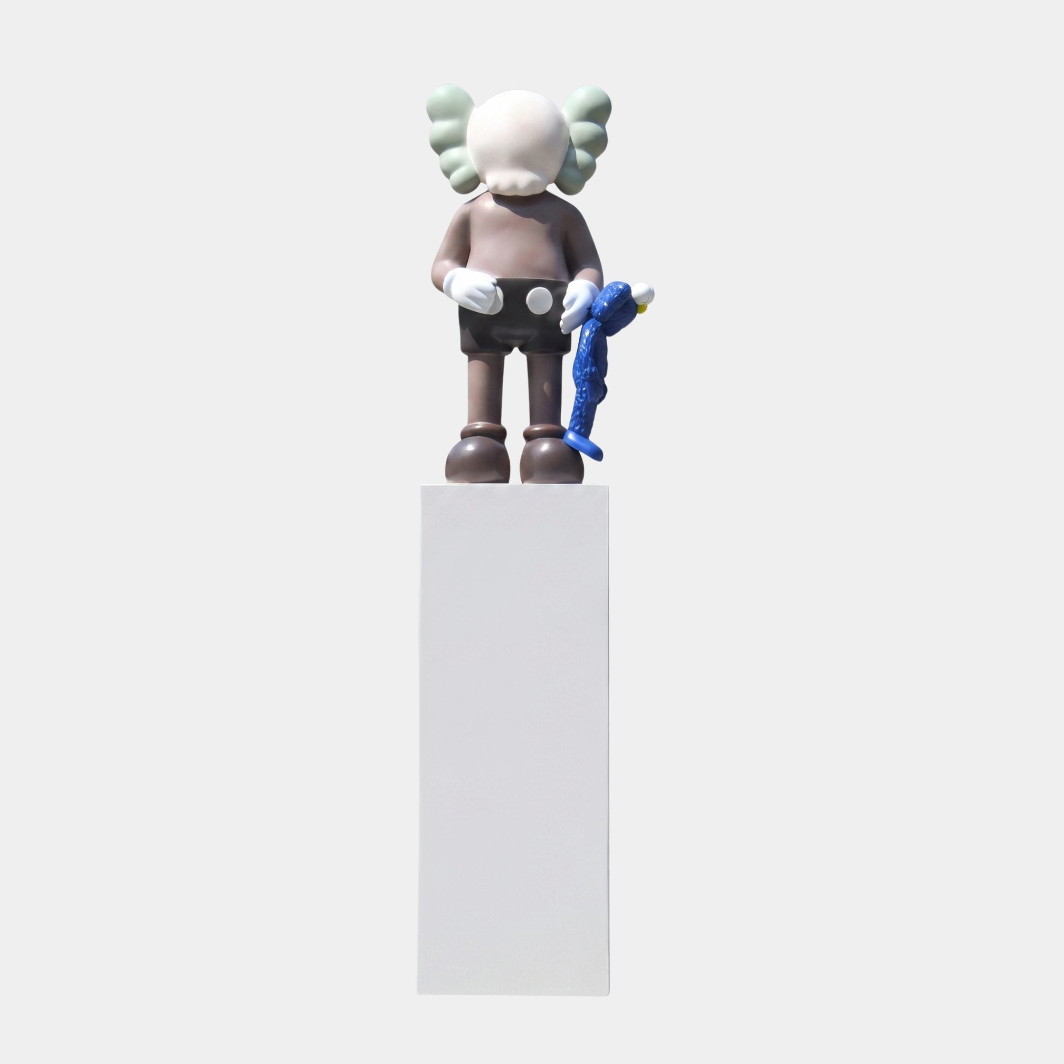 Hartdale Brown & Blue Iconify Furry Toy Sculpture, 145cm fiberglass figure with folded ears holding a blue furry toy, on a white plinth against a plain background.