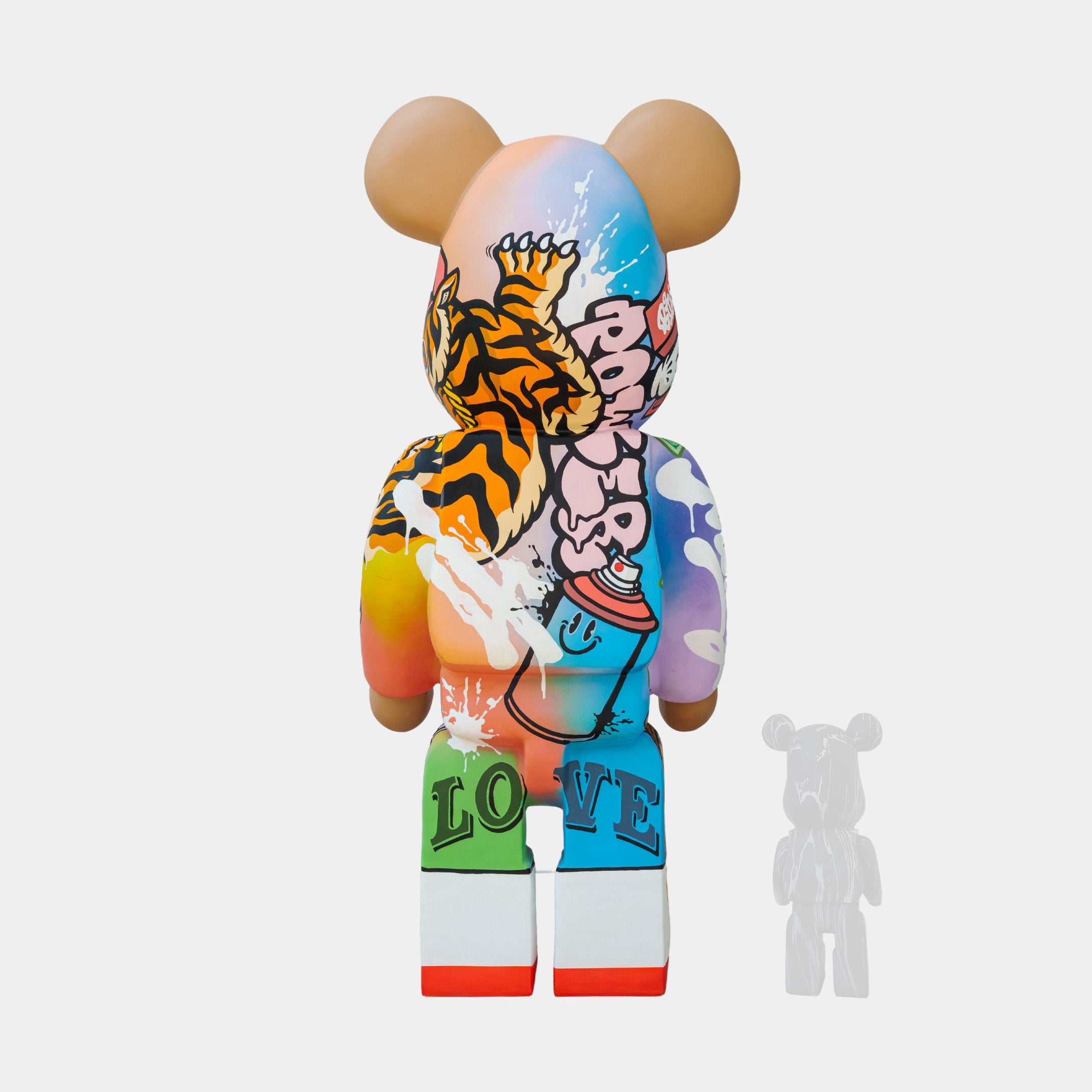The Lucky Paws Bear Sculpture - 165cm by Giant Sculptures is a vibrant, bear-shaped piece inspired by Thai street art. It features a roaring tiger, spray paint can, and the word LOVE in bold. A small translucent bear accompanies for an eclectic finish.