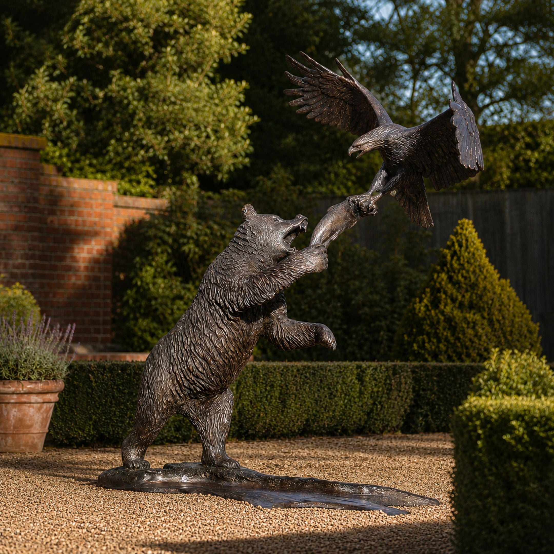Giant Sculptures Large Traditional Rearing Bear and Eagle Bronze Sculpture 200cm in a formal garden, bear reared up clashing with eagle over a fish.