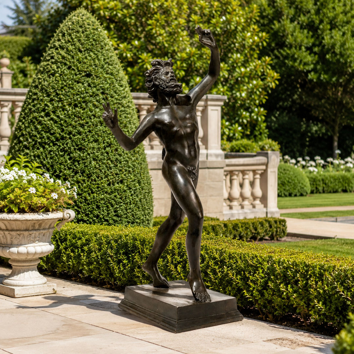 Large Classical Dancing Faun Bronze Sculpture, 190cm, dark bronze nude figure in dynamic dancing pose on a rectangular base, set on a garden patio among hedges.