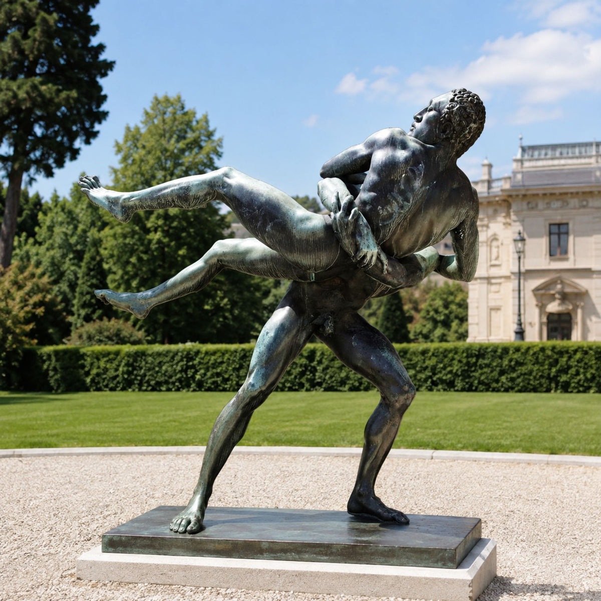 Life-Size Classical Wrestlers Bronze Sculpture, 210cm, showing one nude male figure lifting another mid-throw, on a dark base outdoors near a lawn and building.