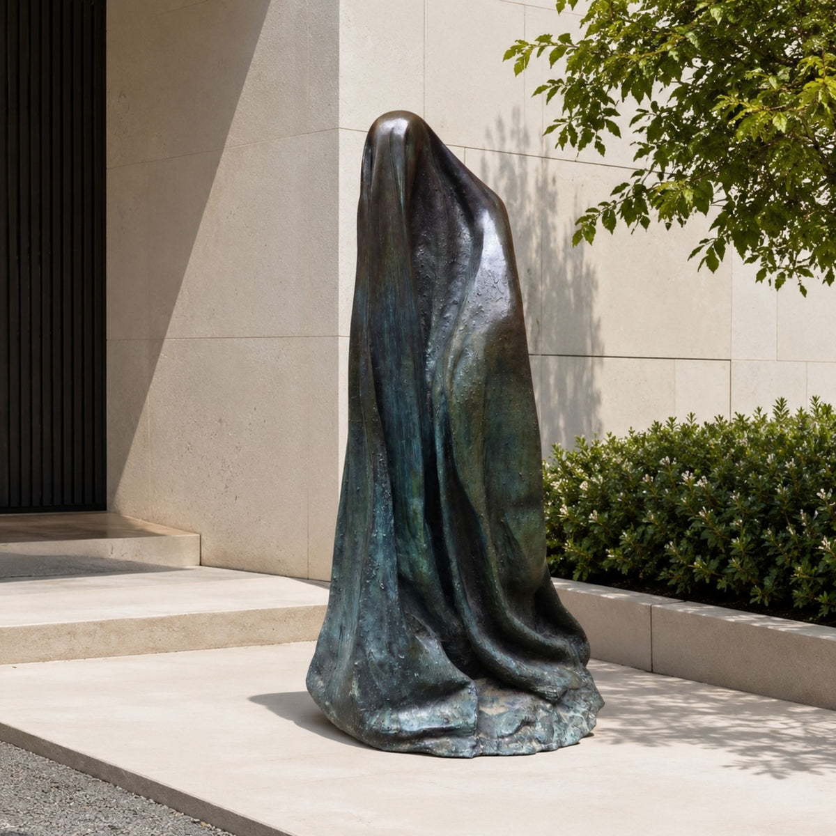 Large Contemporary Shrouded Figure Bronze Sculpture, 190cm, cast bronze with verdigris patina, shown outdoors against a stone wall near greenery.