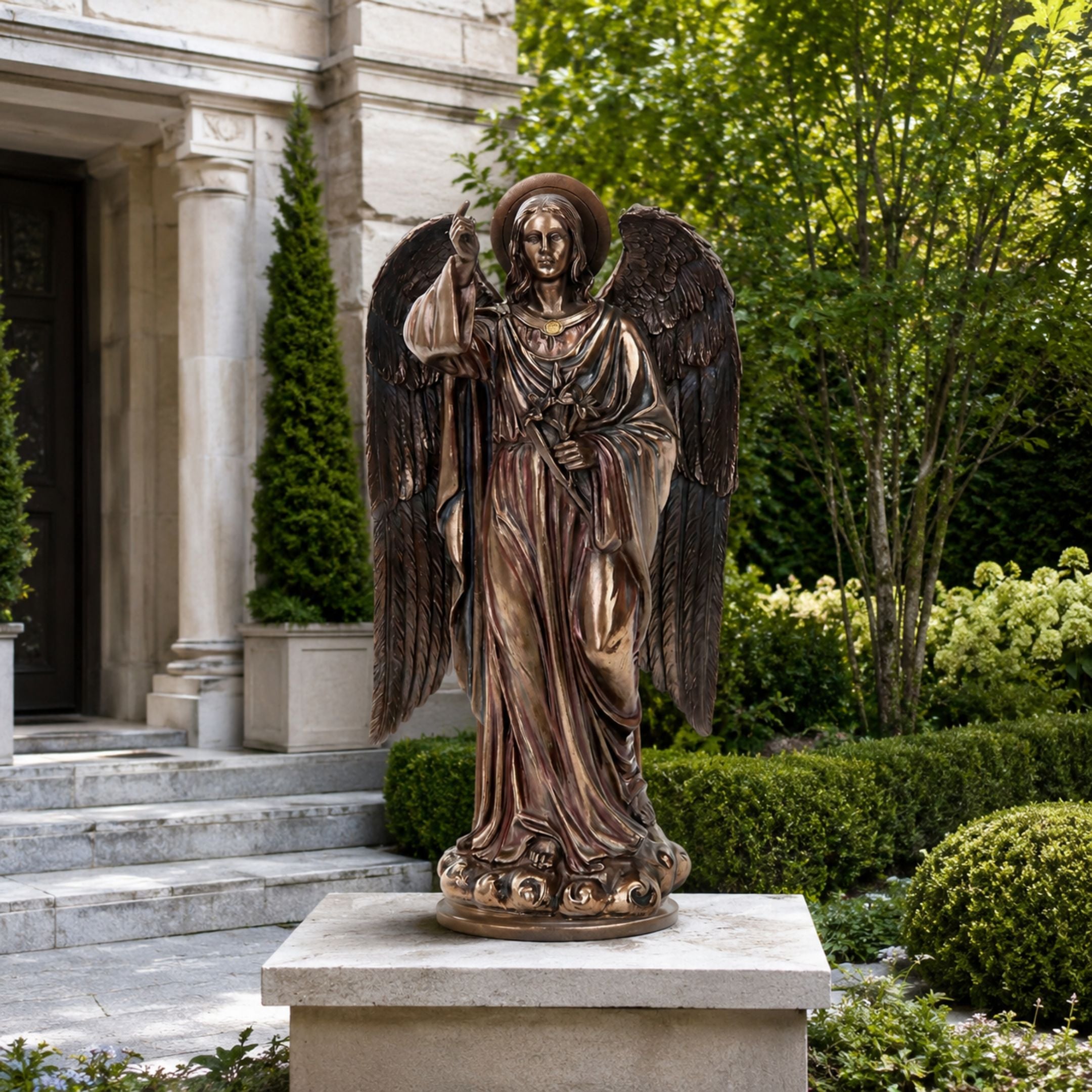 Large Classical Standing Angel Bronze Sculpture, 210cm, with wings spread and hand raised skyward, displayed on a stone pedestal in a garden setting.