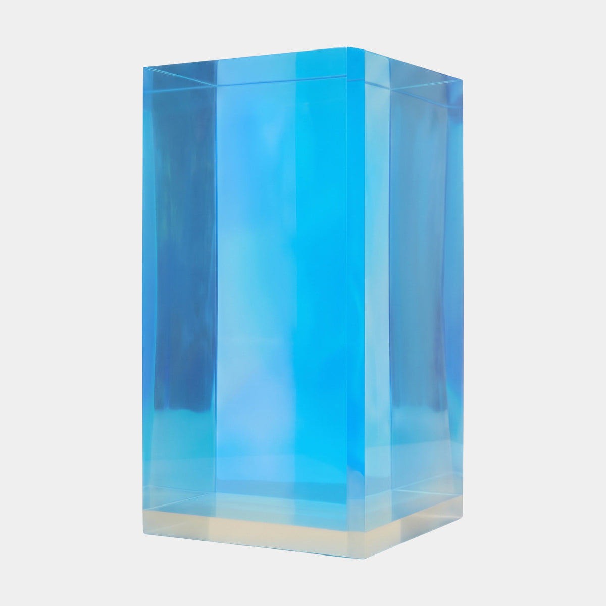 Blue Translucent Square Acrylic Box Sculpture, 60cm, a tall rectangular block in cyan blue with a pale base edge, shown against a plain light grey background.