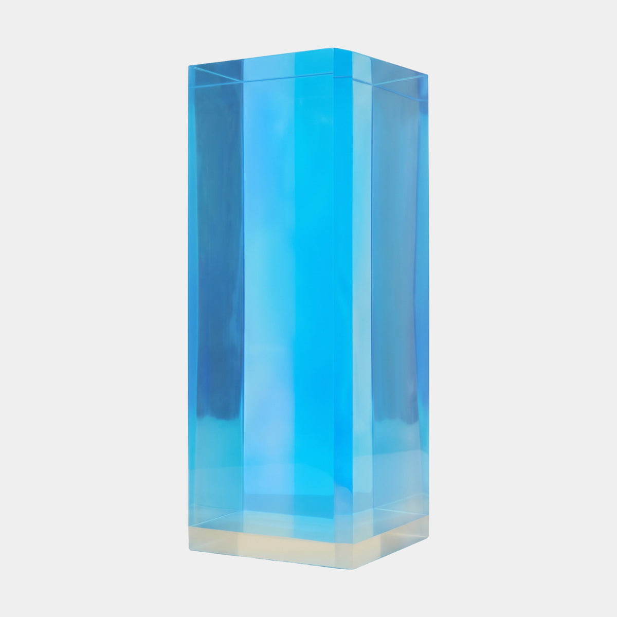 Blue Slender Acrylic Display Plinth - 85cm, a tall translucent blue acrylic column with a pale glowing base, shown on a plain white background.