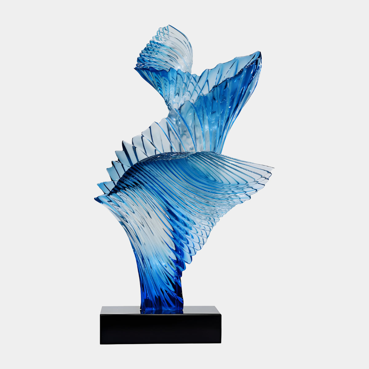 Cobalt Blue Twin Ribbed Sheet Cast Resin Sculpture, 76cm, with one fanned sheet and one serrated trumpet-form sheet on a black marble base, set against a plain white background.