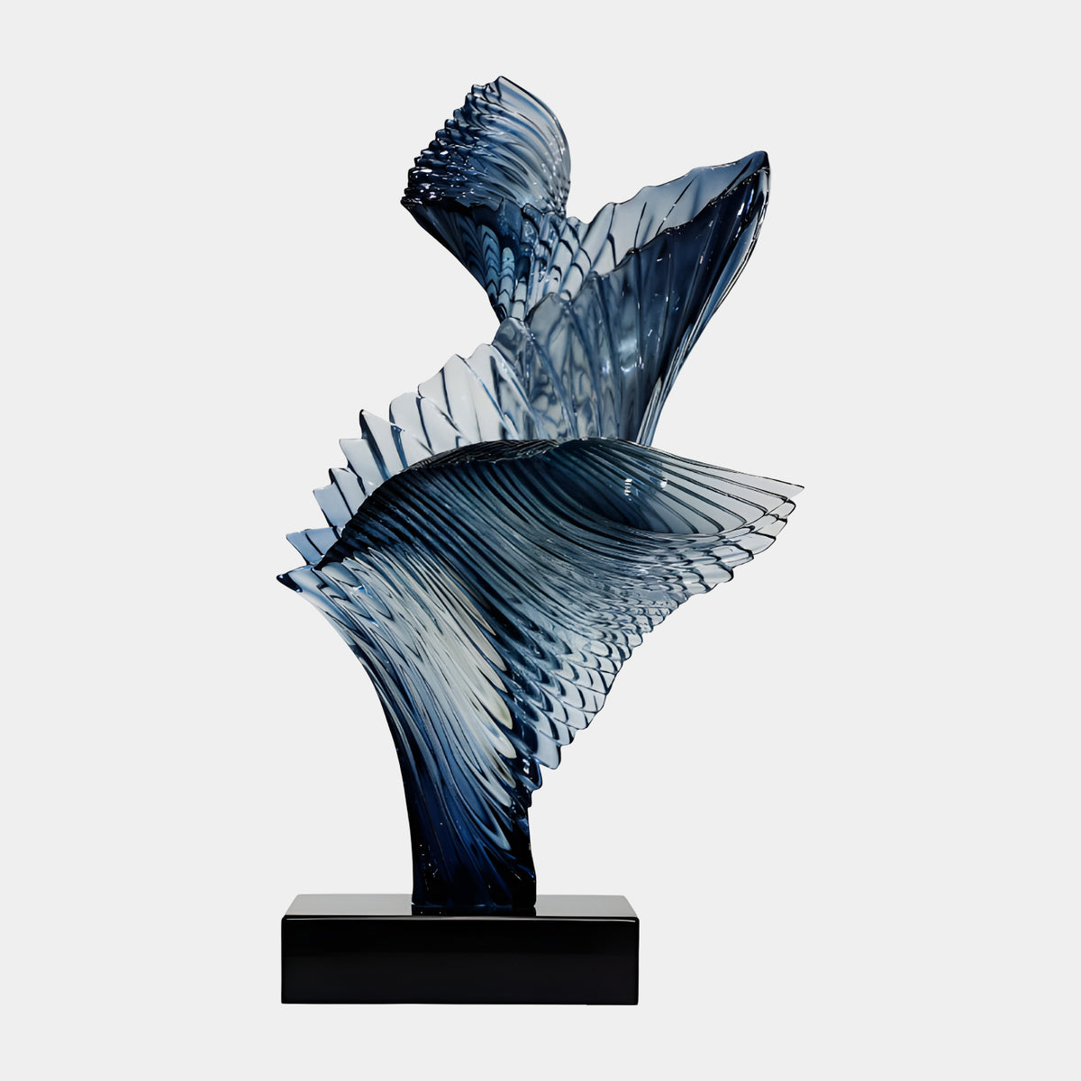 Navy Twin Ribbed Sheet Cast Resin Sculpture - 76cm, with ribbed fanning sheets rising from a dark stem on a black marble base, shown against a plain white background.