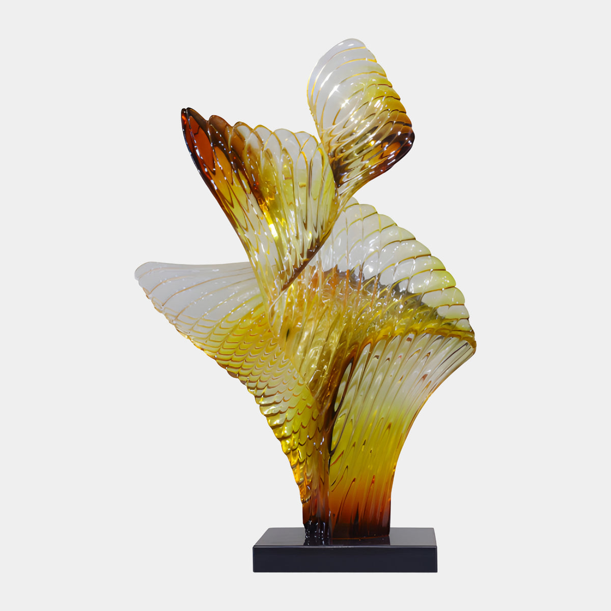 Golden Yellow Furled Leaf Resin Sculpture on Marble, 102cm, with ribbed diamond-textured curling and fan-shaped forms on a black base, set against a plain white background.